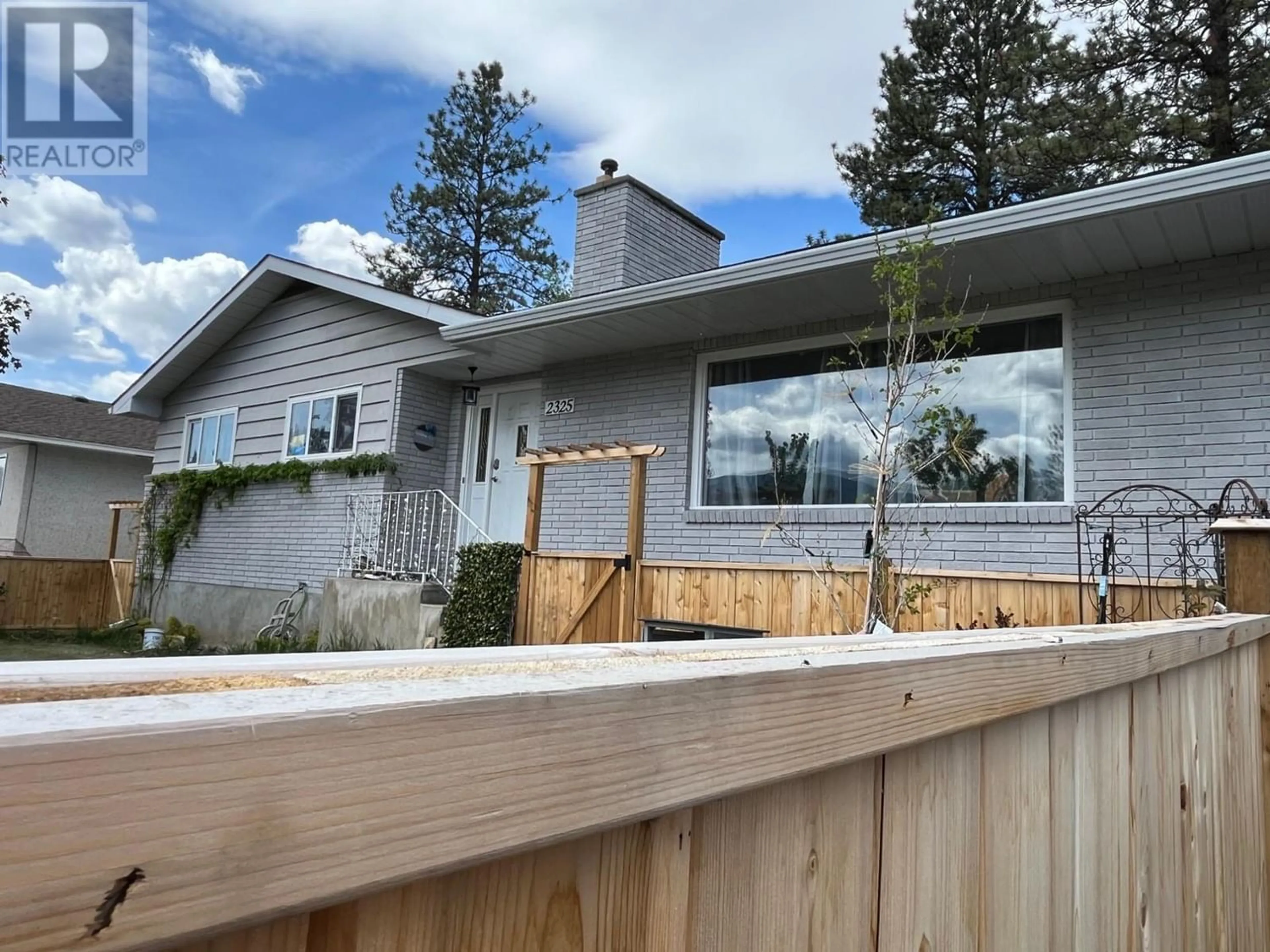 Frontside or backside of a home for 2325 REID AVE, Merritt British Columbia V1K1J5