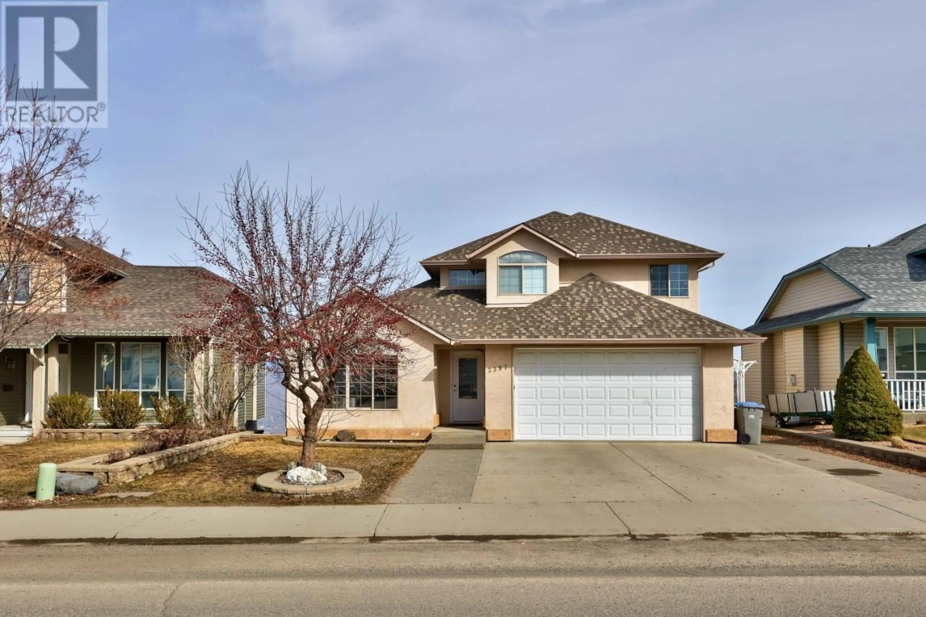 Frontside or backside of a home for 2397 ABBEYGLEN WAY, Kamloops British Columbia V1S1V7