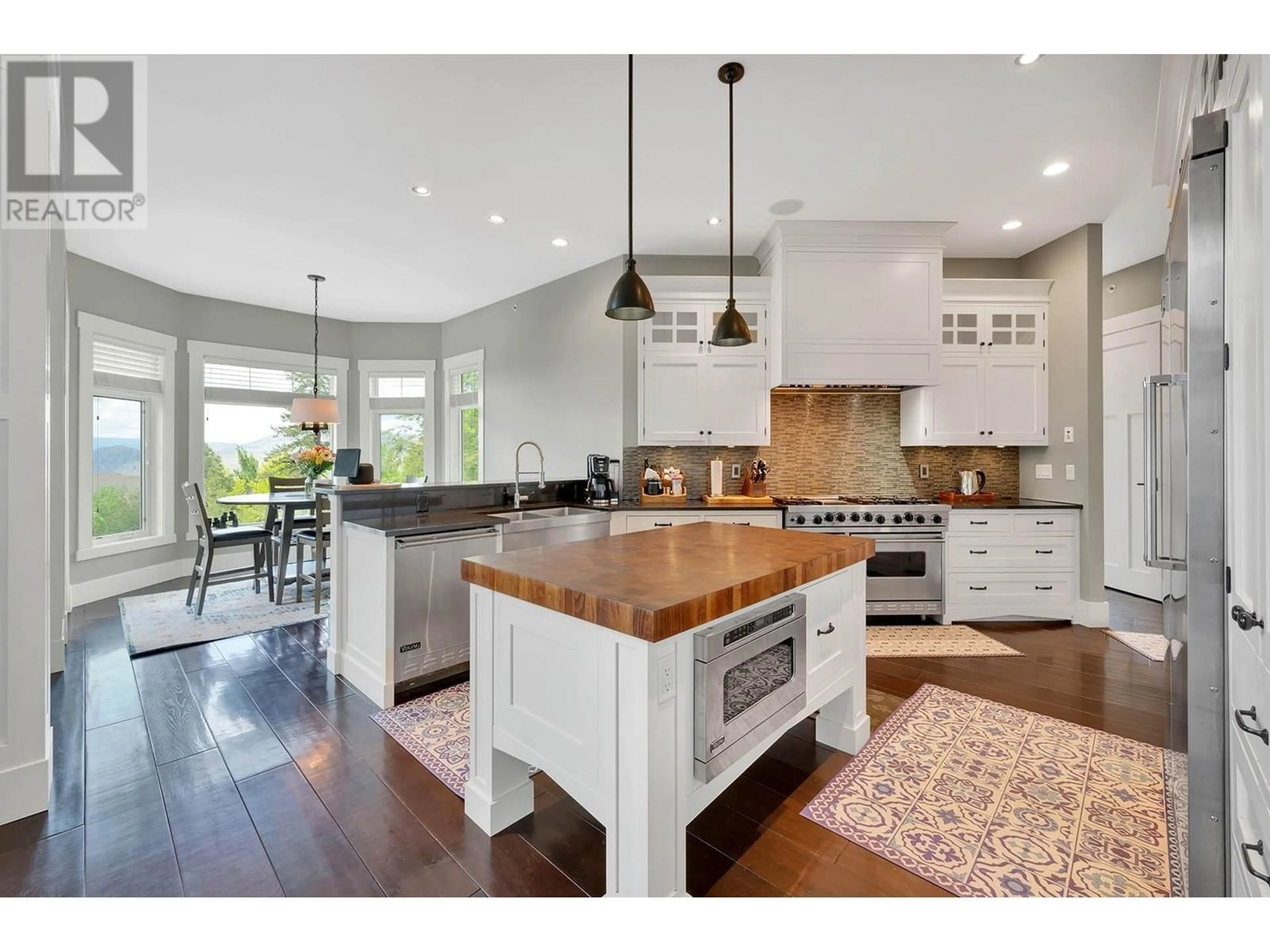 Open concept kitchen, wood/laminate floor for 1690 ROSE HILL ROAD, Kamloops British Columbia V2E0A3