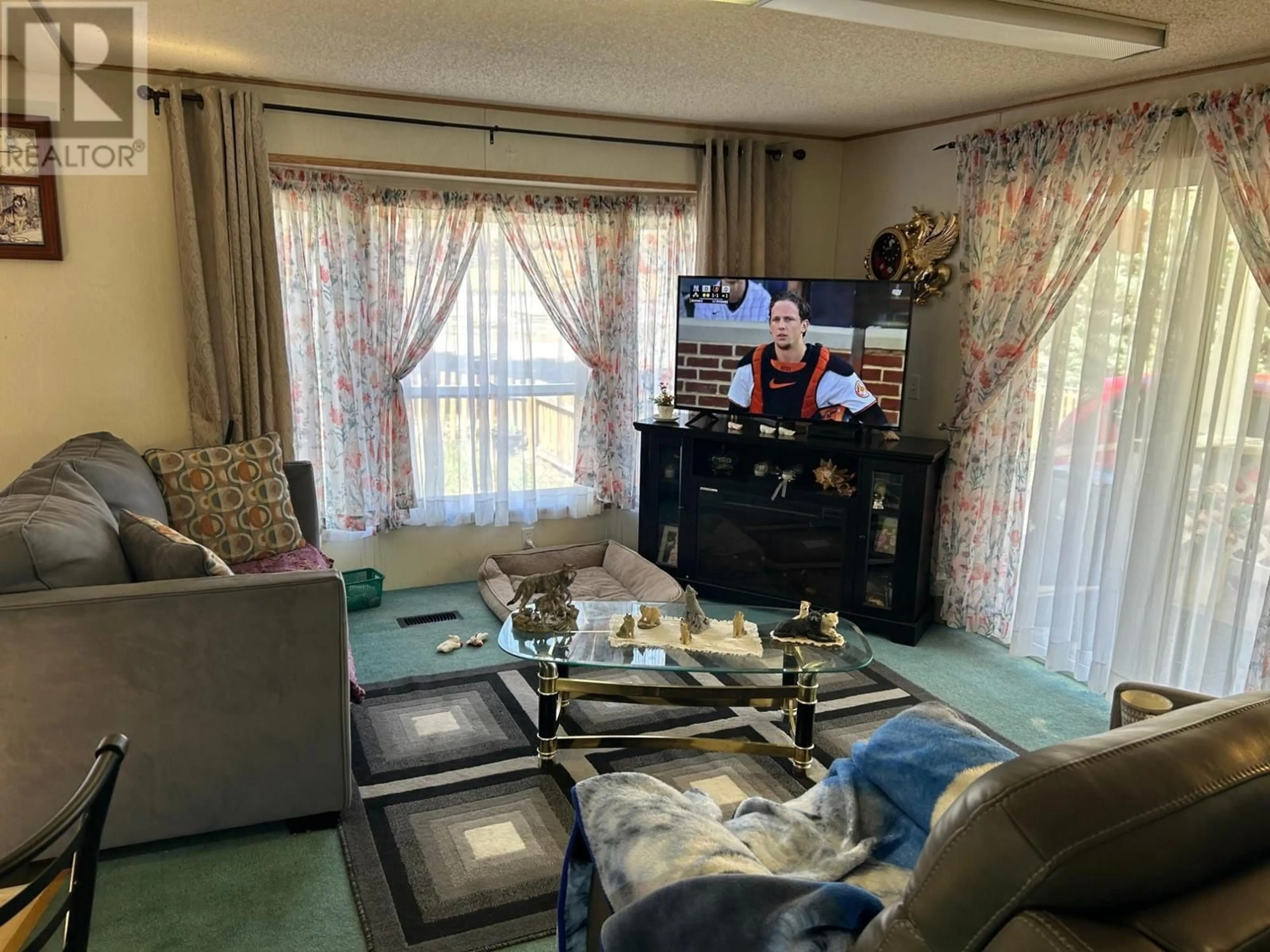 Living room with furniture, unknown for 2388 QUILCHENA AVENUE, Merritt British Columbia V1K1B8