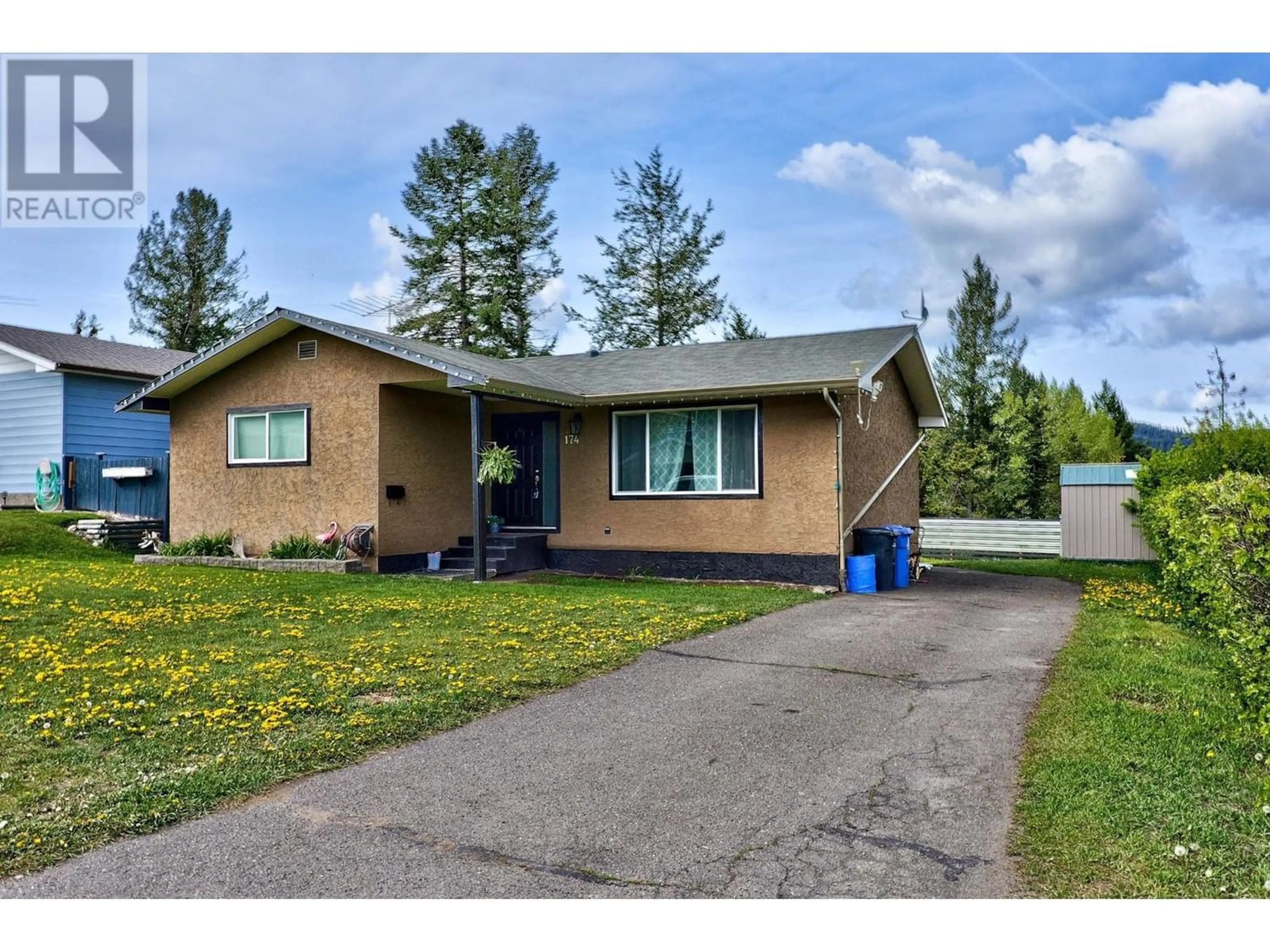 Frontside or backside of a home for 174 PONDEROSA AVE, Logan Lake British Columbia V0K1W0