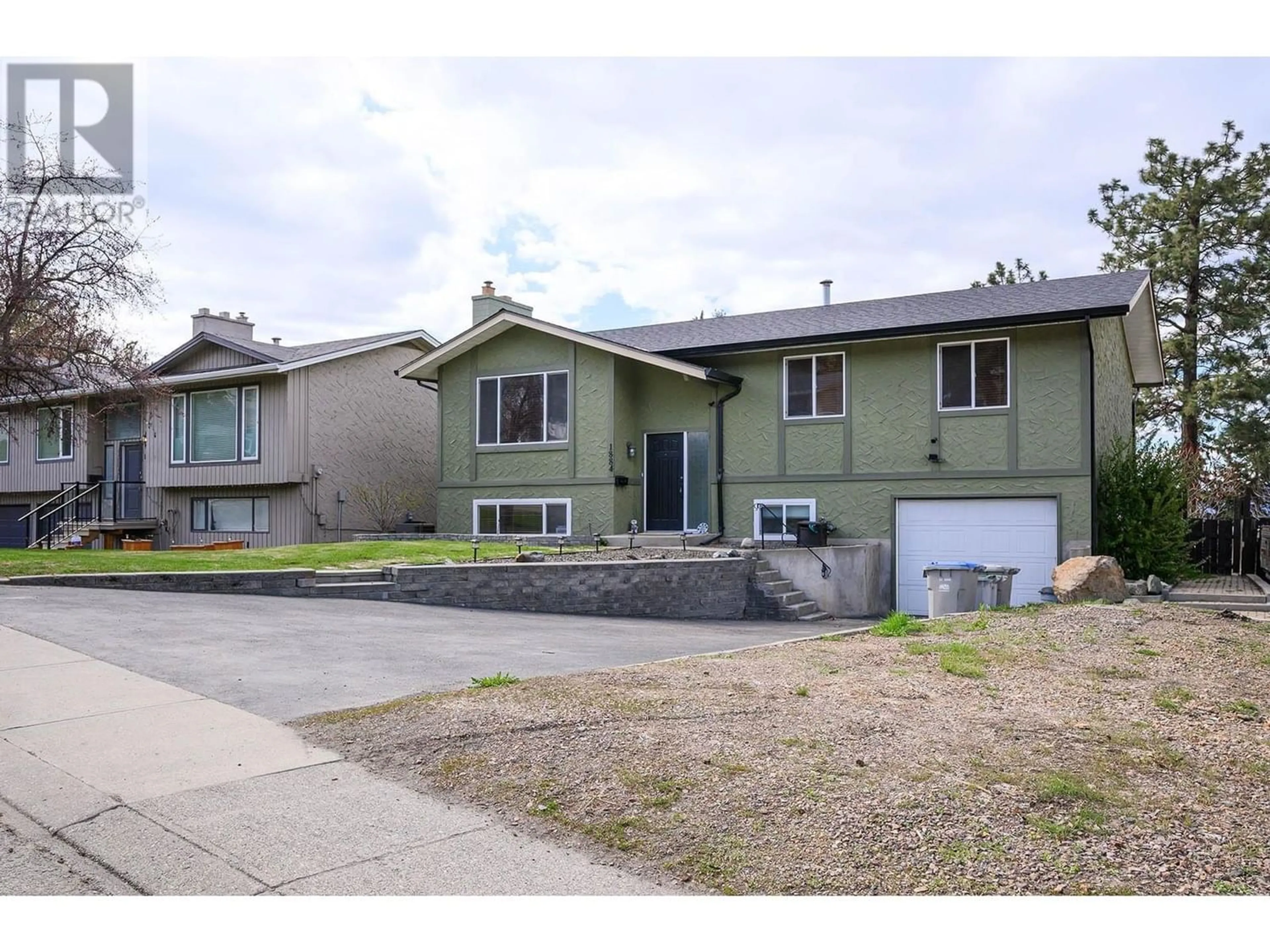 Frontside or backside of a home for 1884 SPRINGHILL DRIVE, Kamloops British Columbia V2E1J3