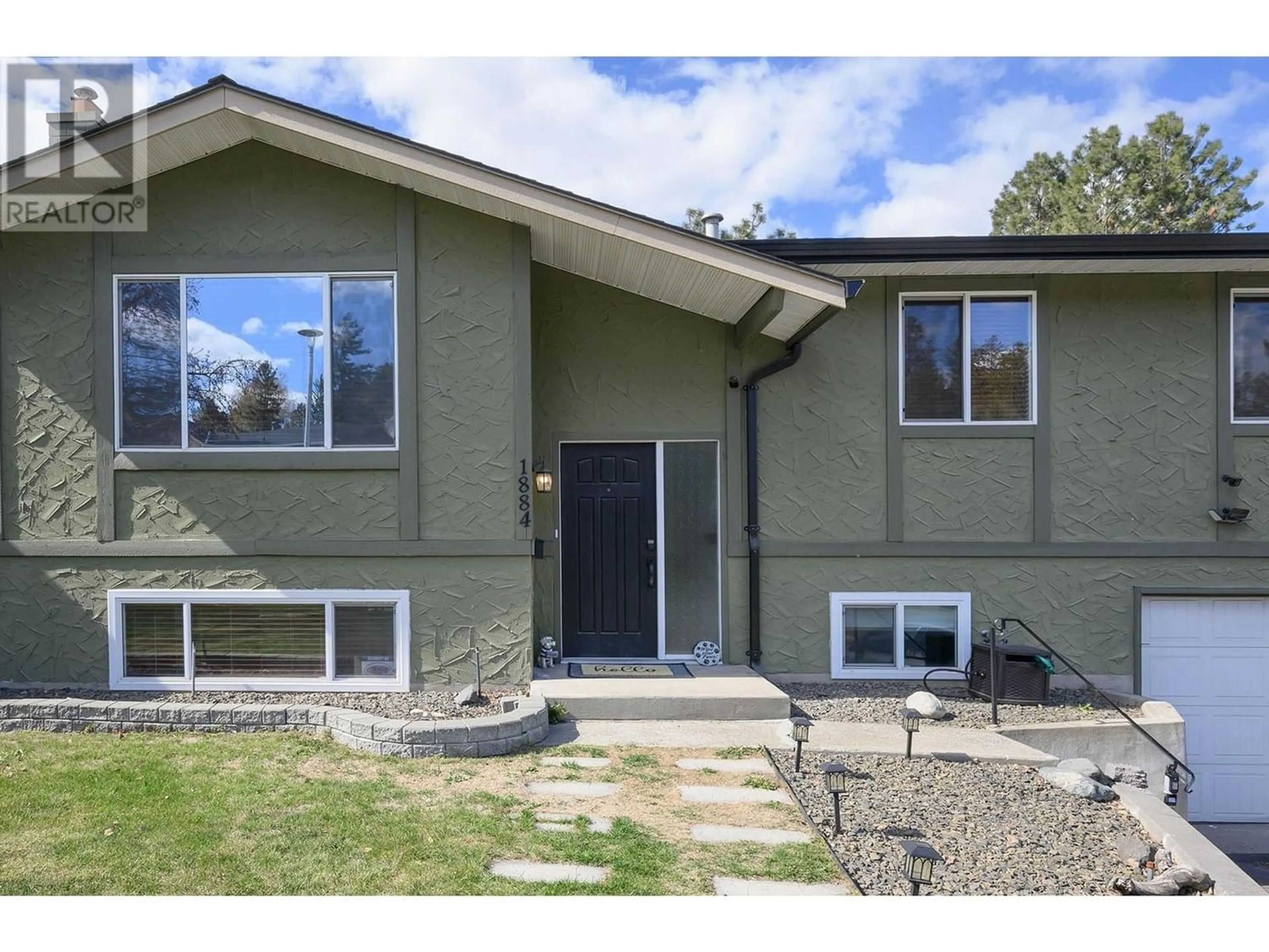 Frontside or backside of a home for 1884 SPRINGHILL DRIVE, Kamloops British Columbia V2E1J3