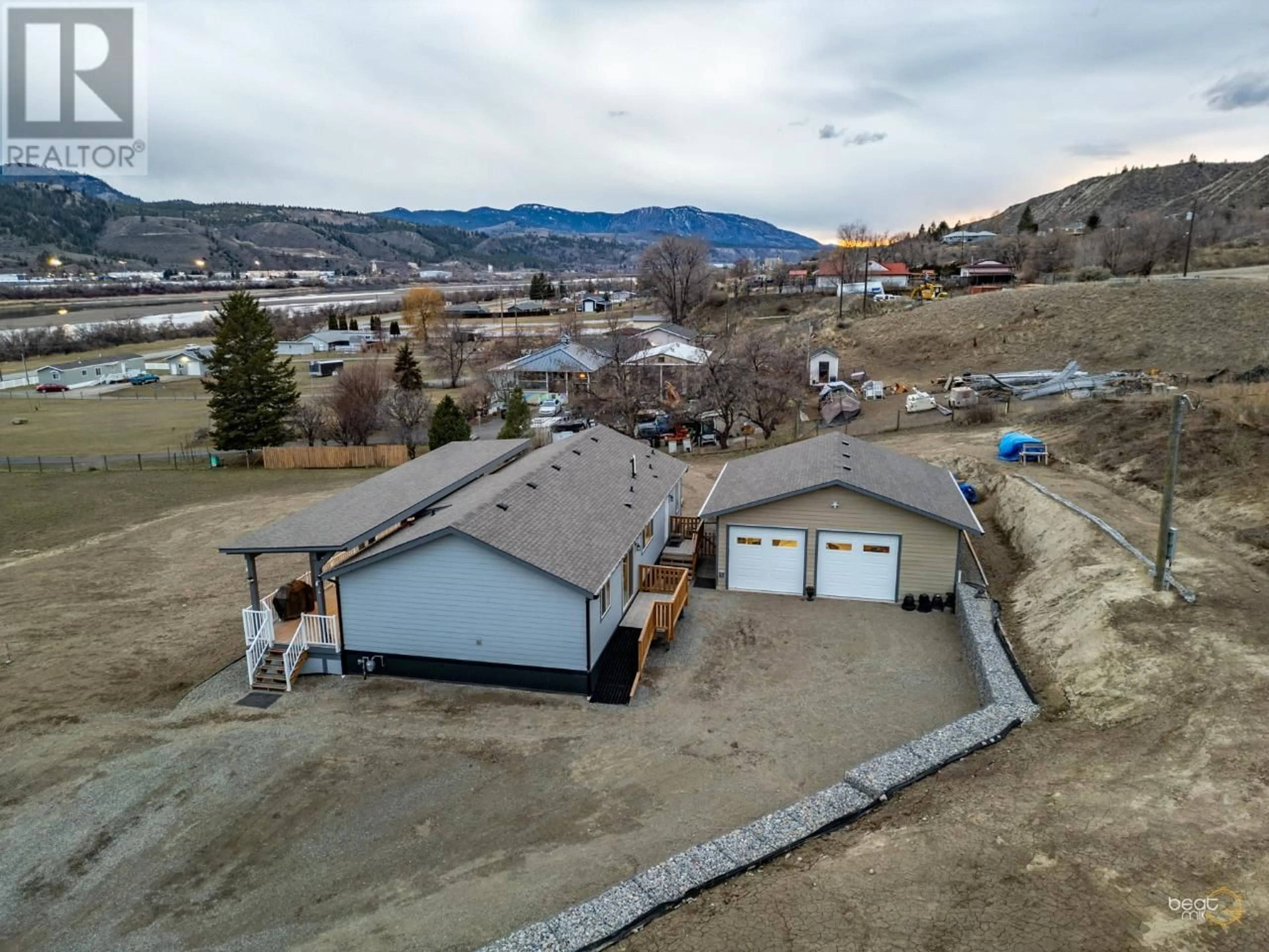 Frontside or backside of a home, the street view for 3209 SHUSWAP Road, Kamloops British Columbia V2H1T1