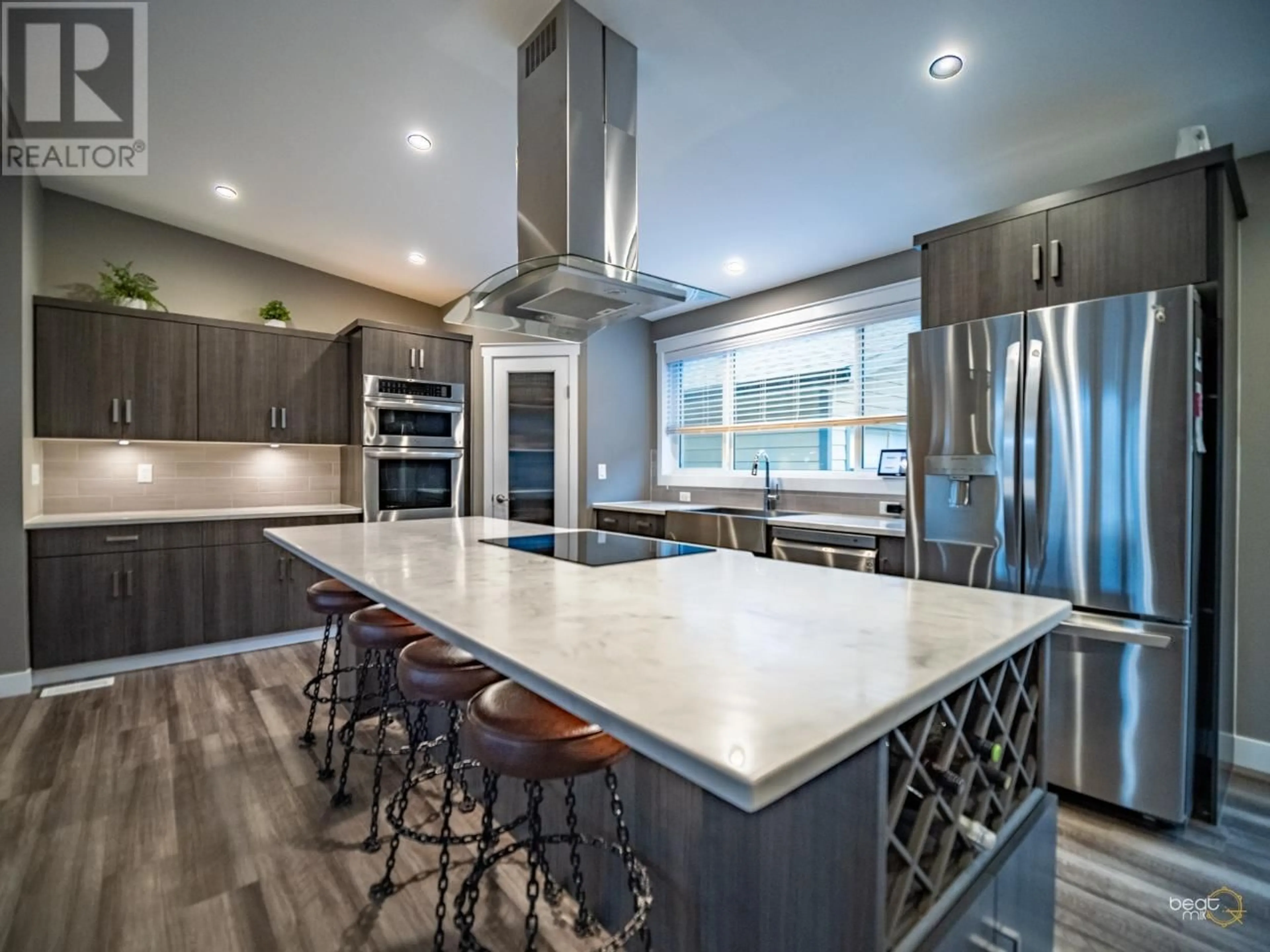 Contemporary kitchen, wood floors for 3209 SHUSWAP Road, Kamloops British Columbia V2H1T1