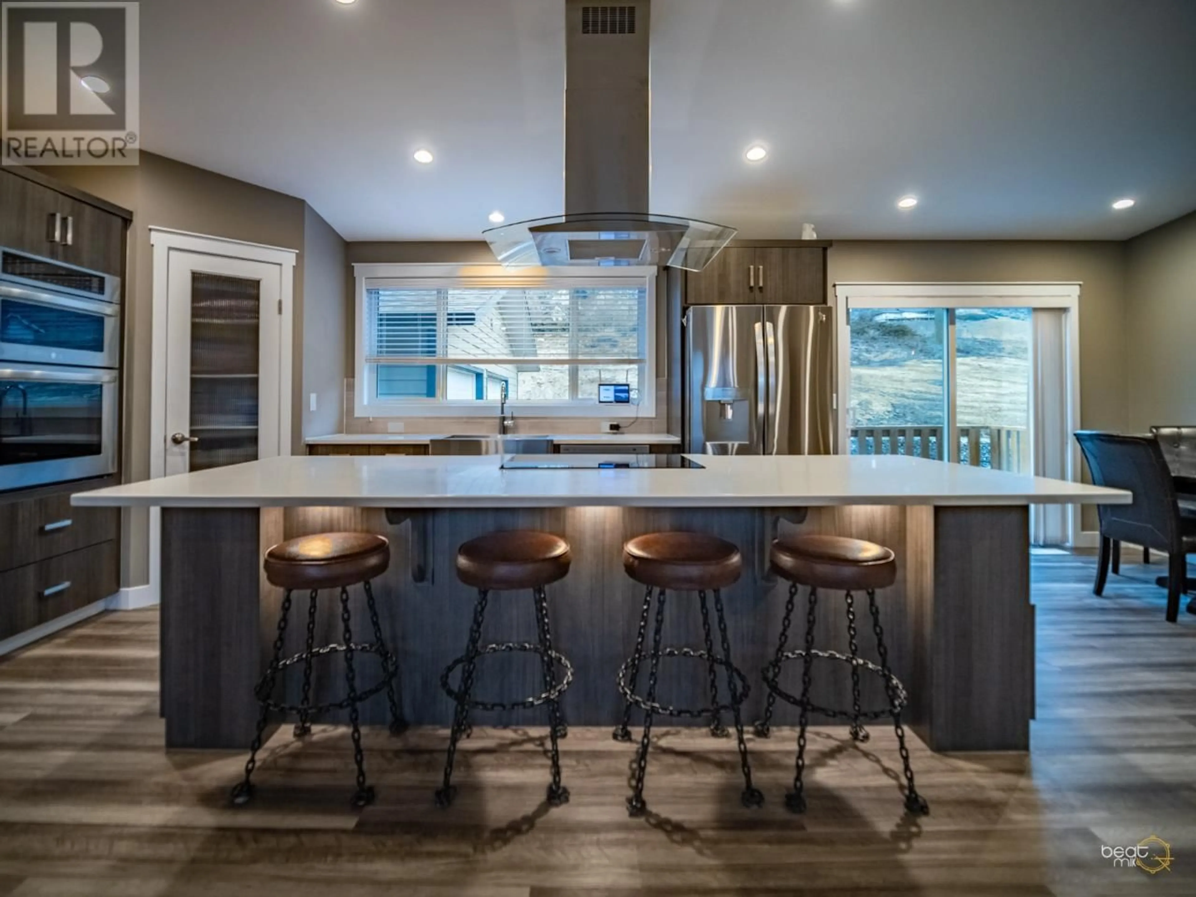 Contemporary kitchen, wood floors for 3209 SHUSWAP Road, Kamloops British Columbia V2H1T1