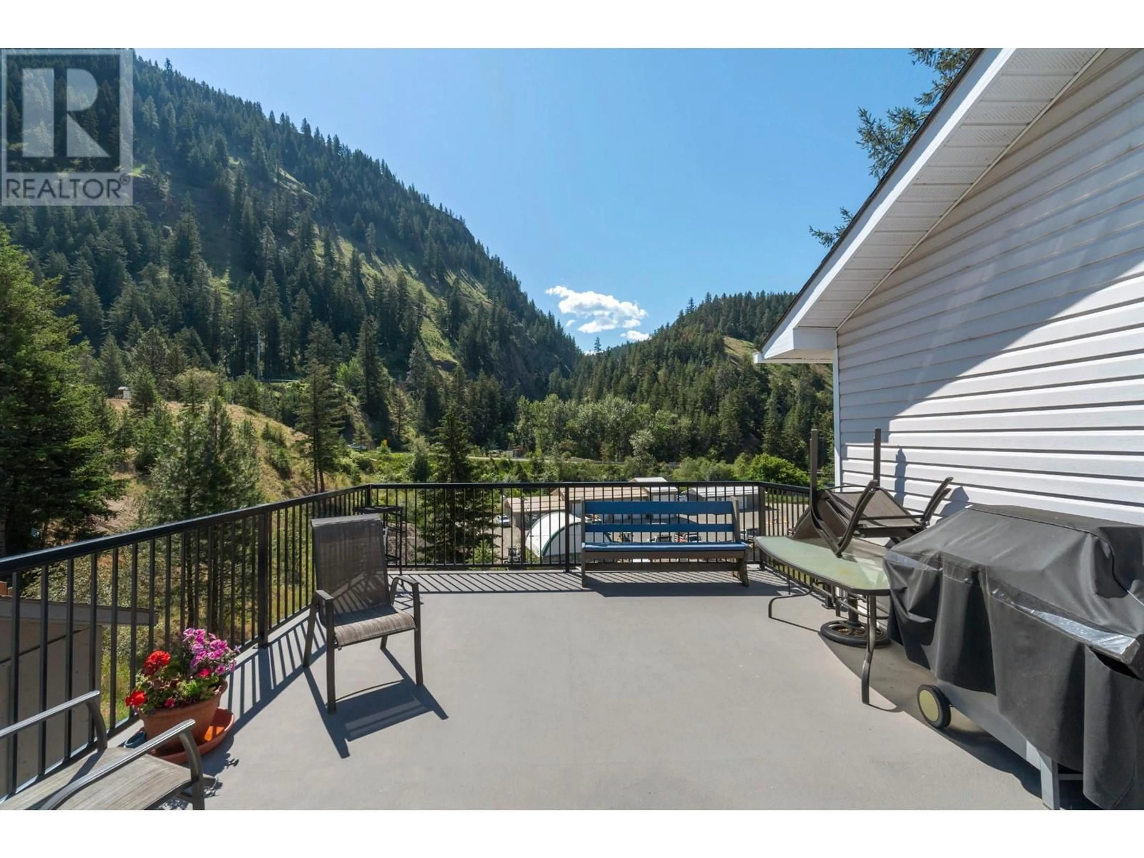 Patio, the fenced backyard for 1117 THOMPSON Avenue, Chase British Columbia V0E1M0