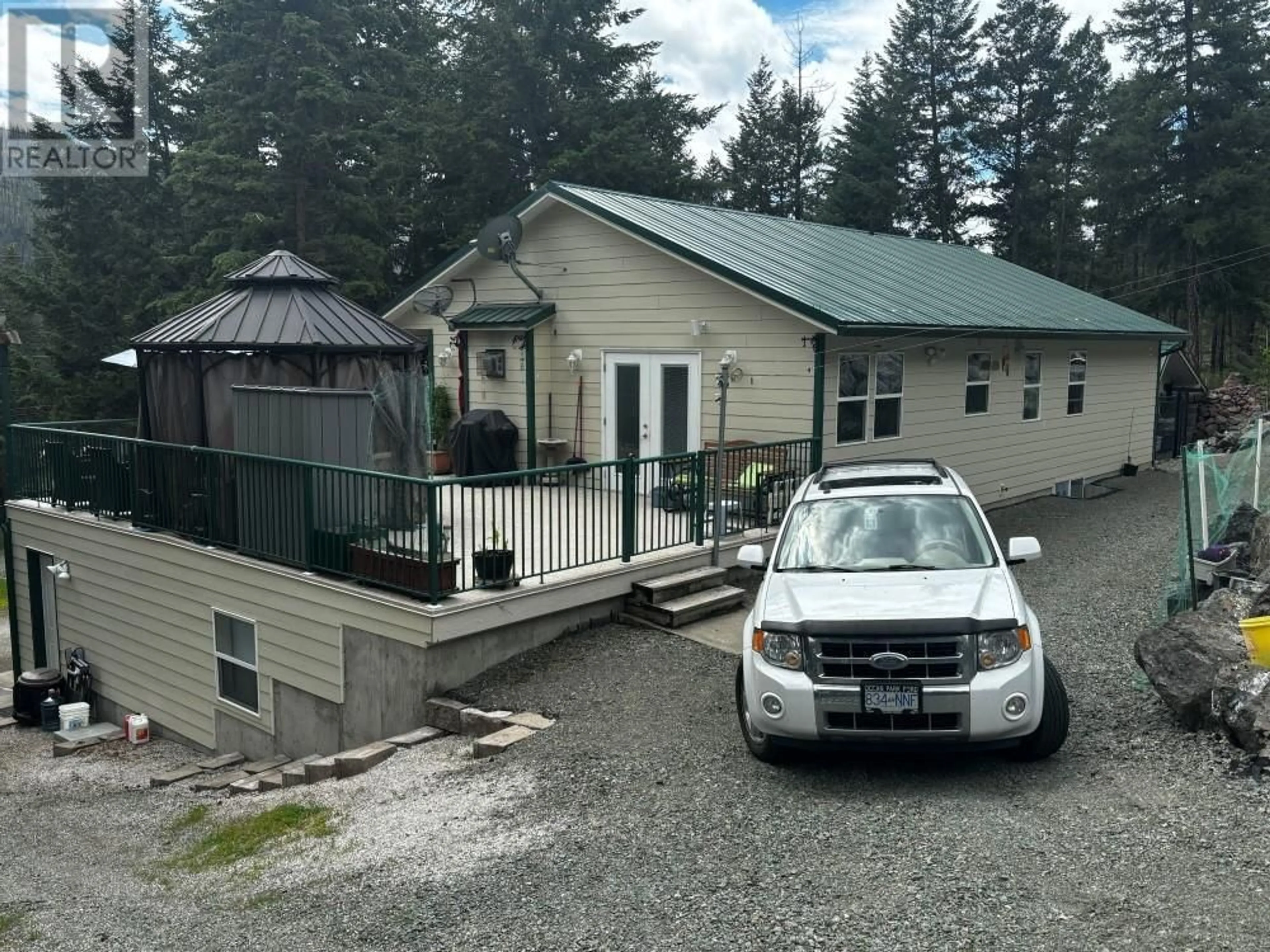A pic from outside/outdoor area/front of a property/back of a property/a pic from drone, mountain view for 2297 LOON LAKE ROAD, Loon Lake British Columbia V0K1H0