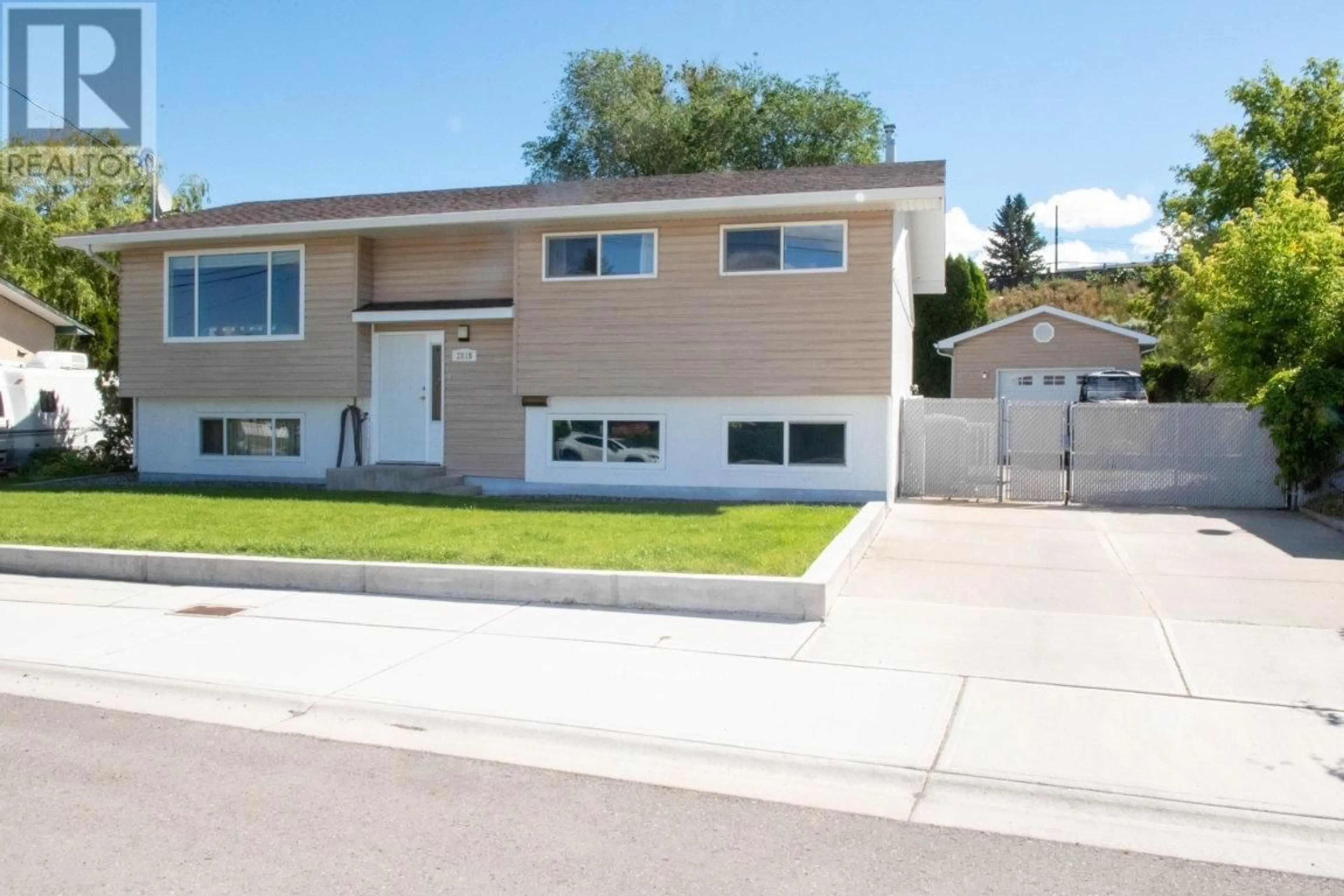 Home with vinyl exterior material, street for 2819 CRANNA CRESCENT, Merritt British Columbia V1K1E5