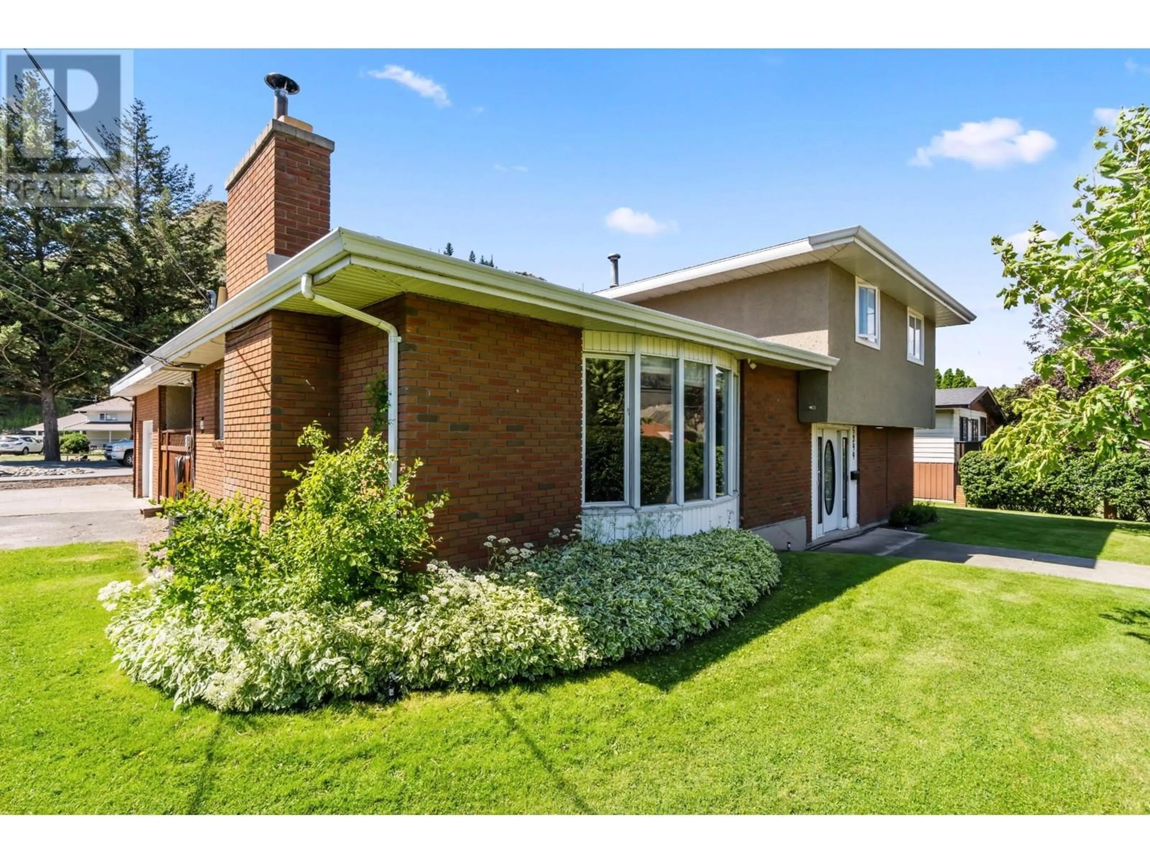 Home with brick exterior material for 5299 DALLAS DRIVE, Kamloops British Columbia