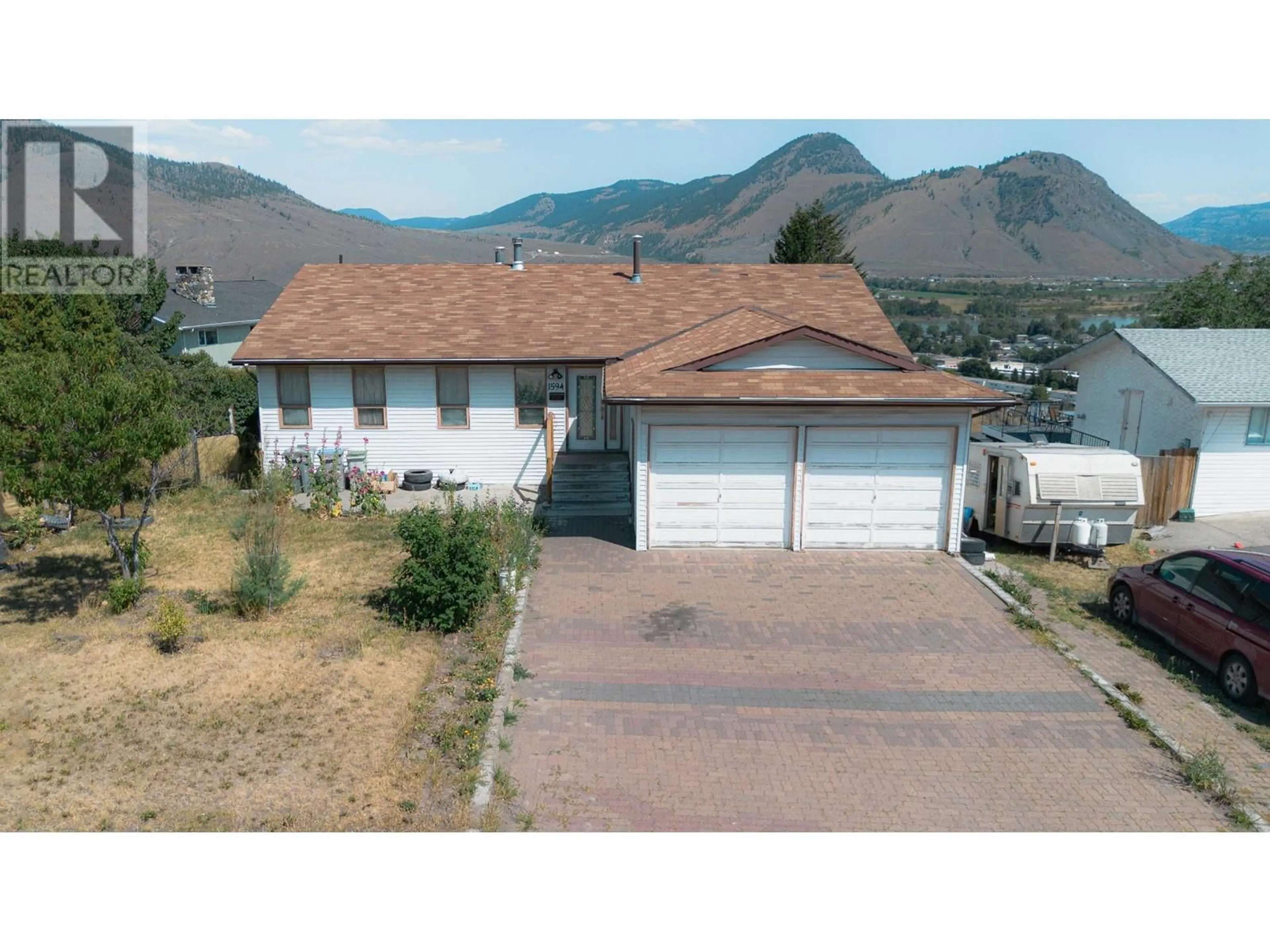 Frontside or backside of a home for 1594 HILLCREST AVE, Kamloops British Columbia