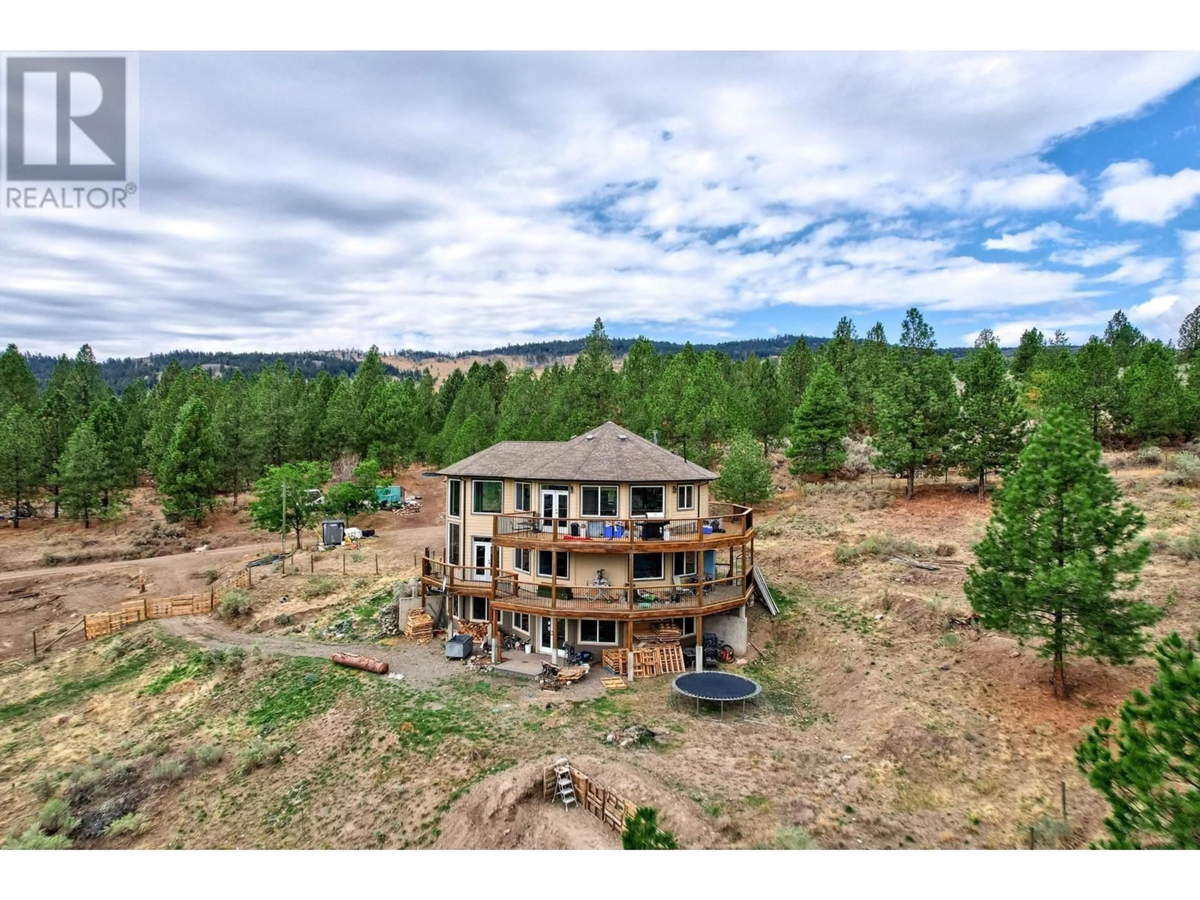 A pic from outside/outdoor area/front of a property/back of a property/a pic from drone, unknown for 4377 SHUSWAP ROAD, Kamloops British Columbia V2H1S8