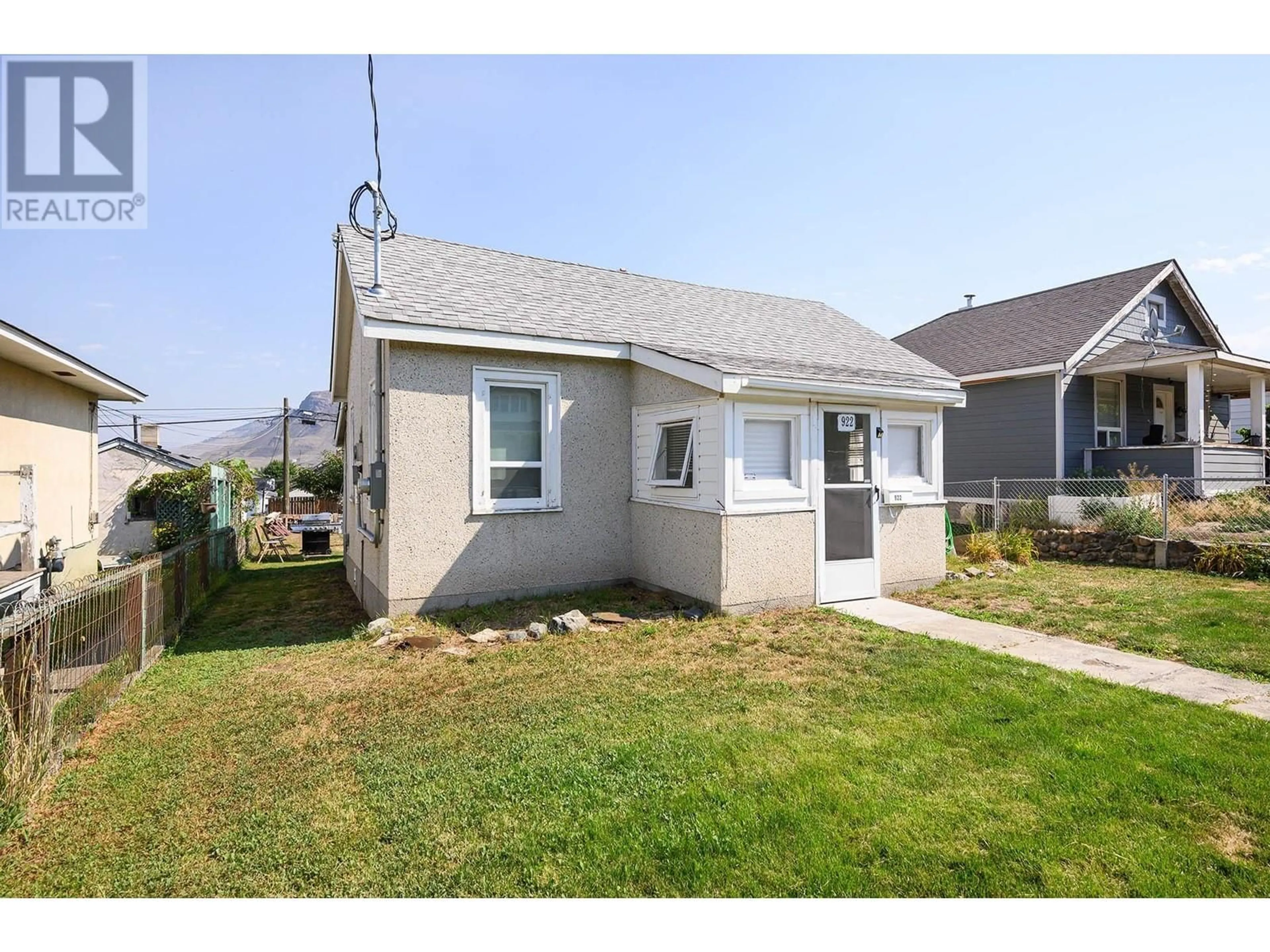 Frontside or backside of a home, the fenced backyard for 922 COLUMBIA Street, Kamloops British Columbia V2C2V9