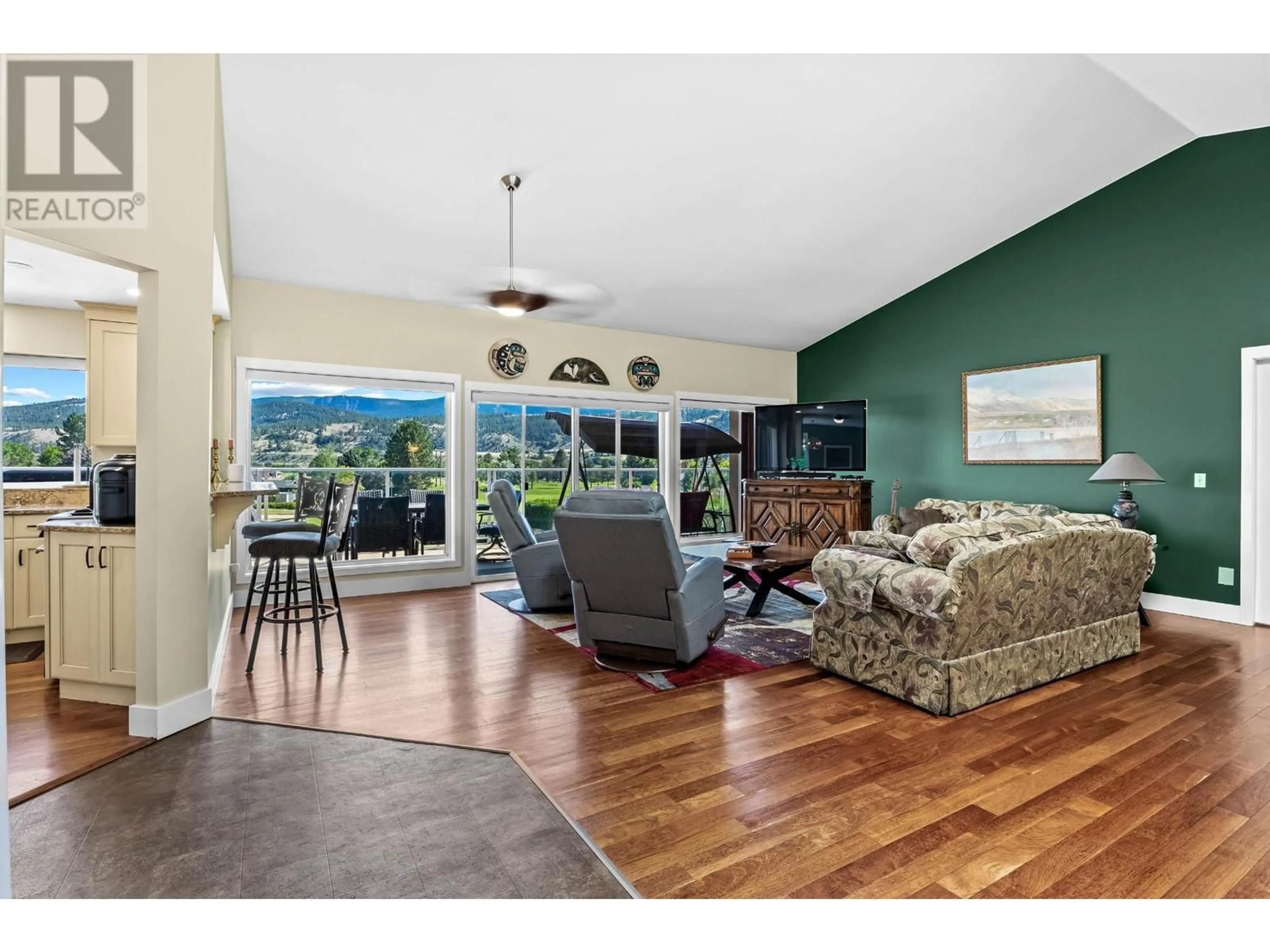 Living room with furniture, wood/laminate floor for 3464 NAVATANEE DRIVE, Kamloops British Columbia V2H1S1