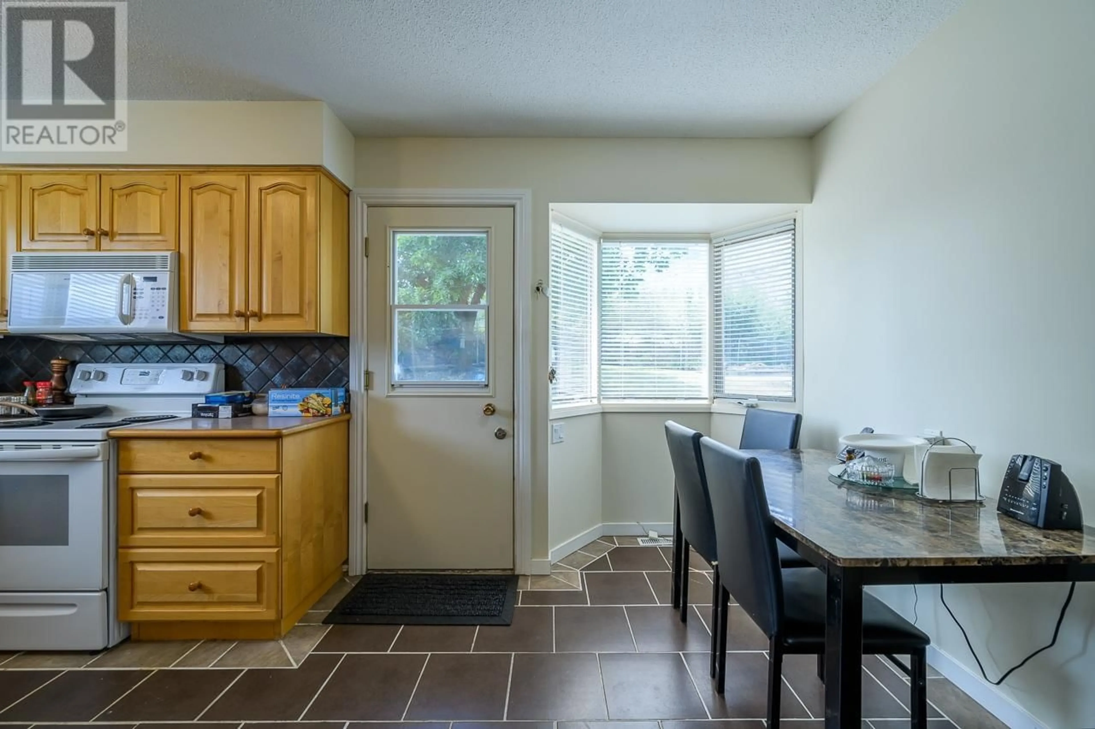 Standard kitchen, ceramic floors, cottage for 925 SERLE Road, Kamloops British Columbia V2B6M1