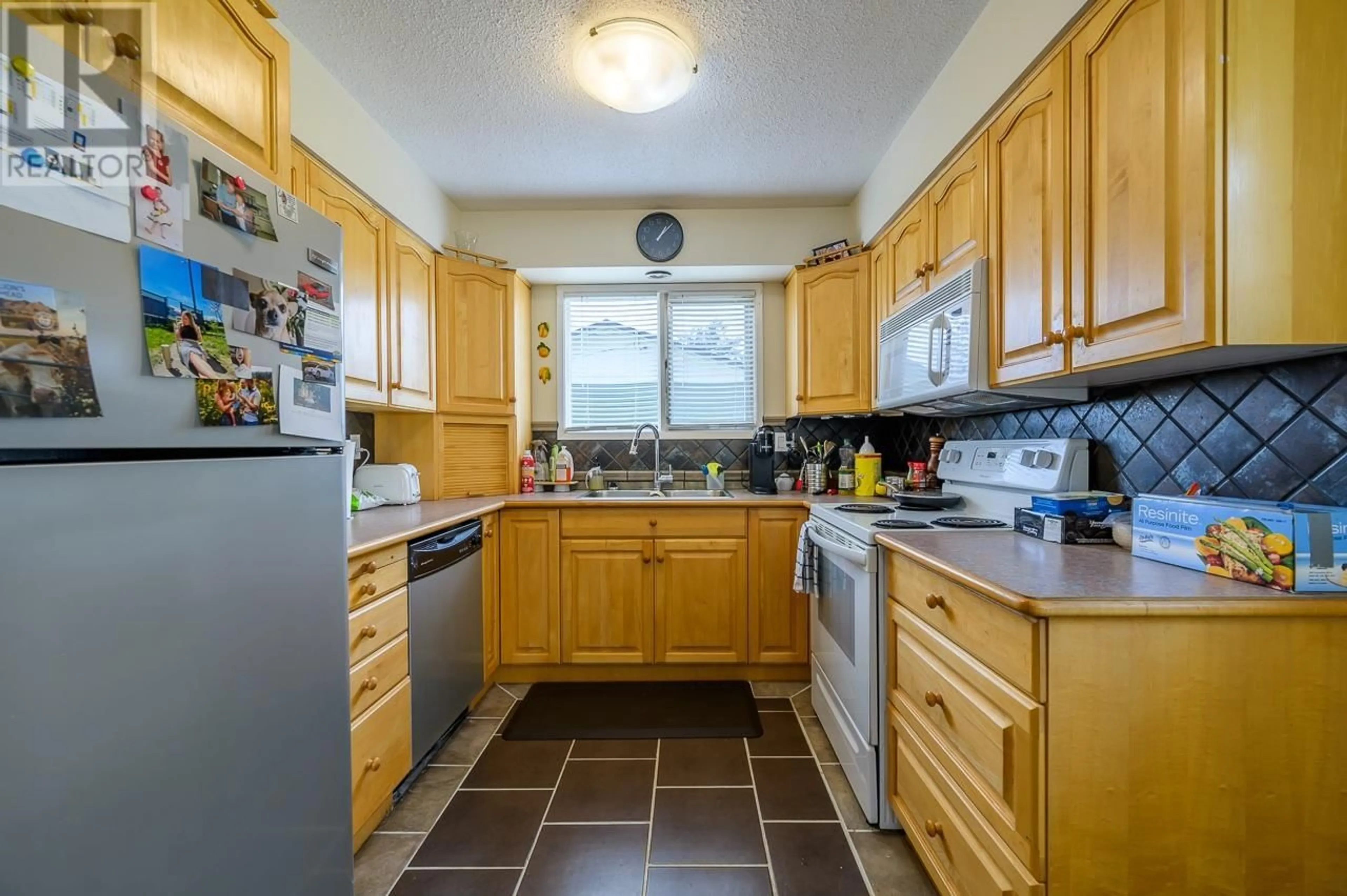 Standard kitchen, wood floors for 925 SERLE Road, Kamloops British Columbia V2B6M1