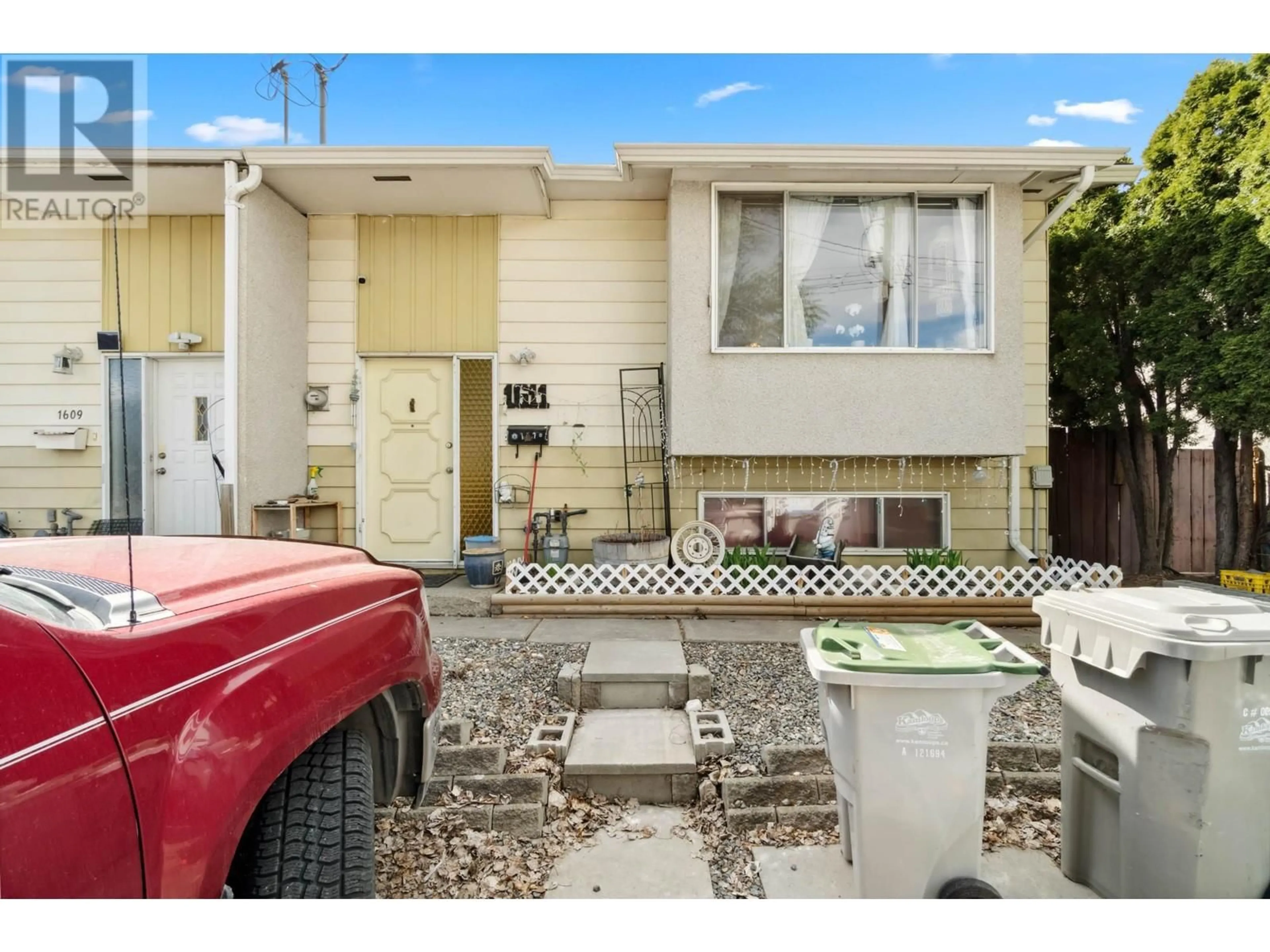 A pic from exterior of the house or condo, the fenced backyard for 1611 SPARTAN Place, Kamloops British Columbia V2B7Z3