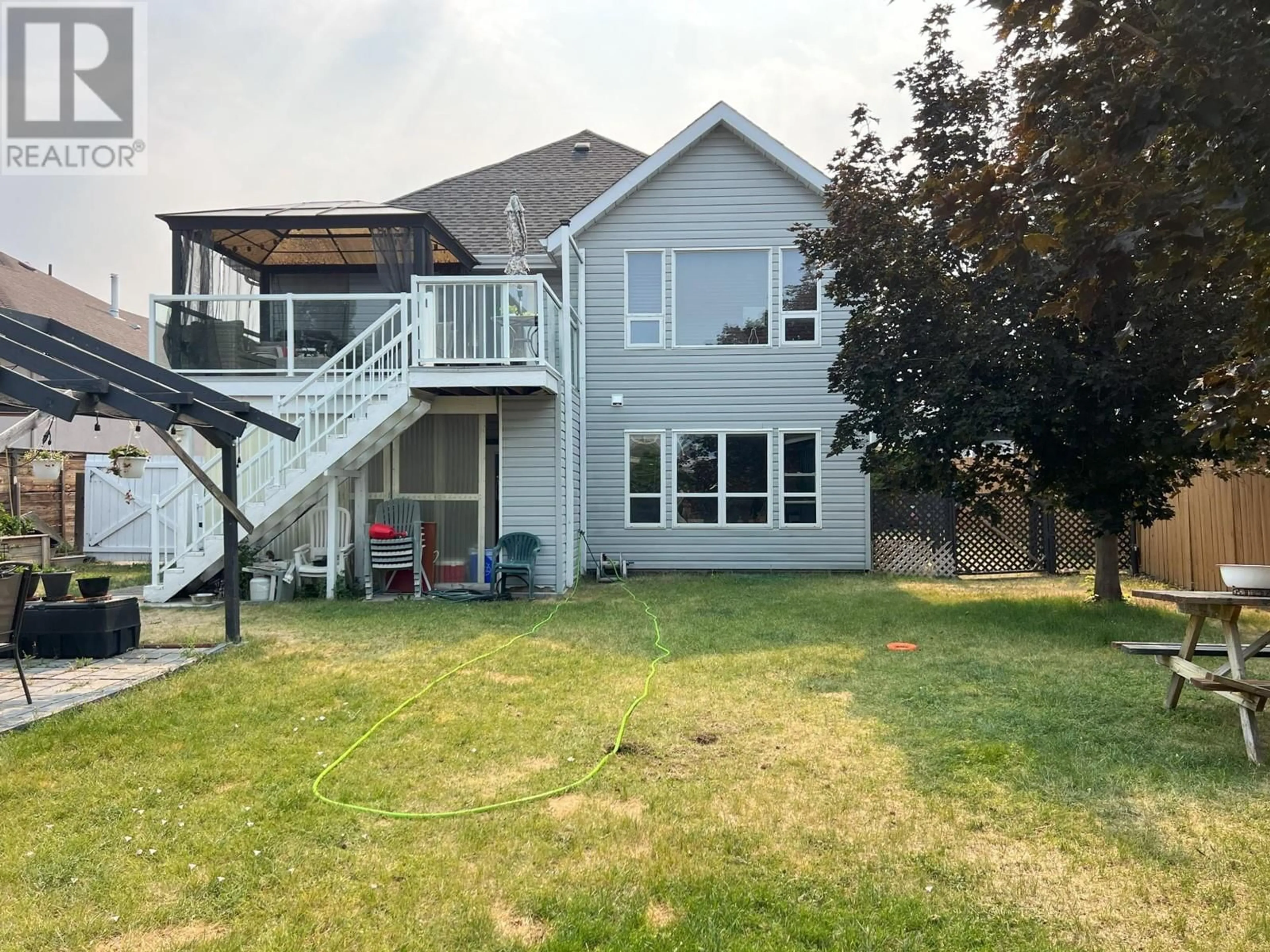 Frontside or backside of a home for 1661 BANN STREET, Merritt British Columbia V1K1E9