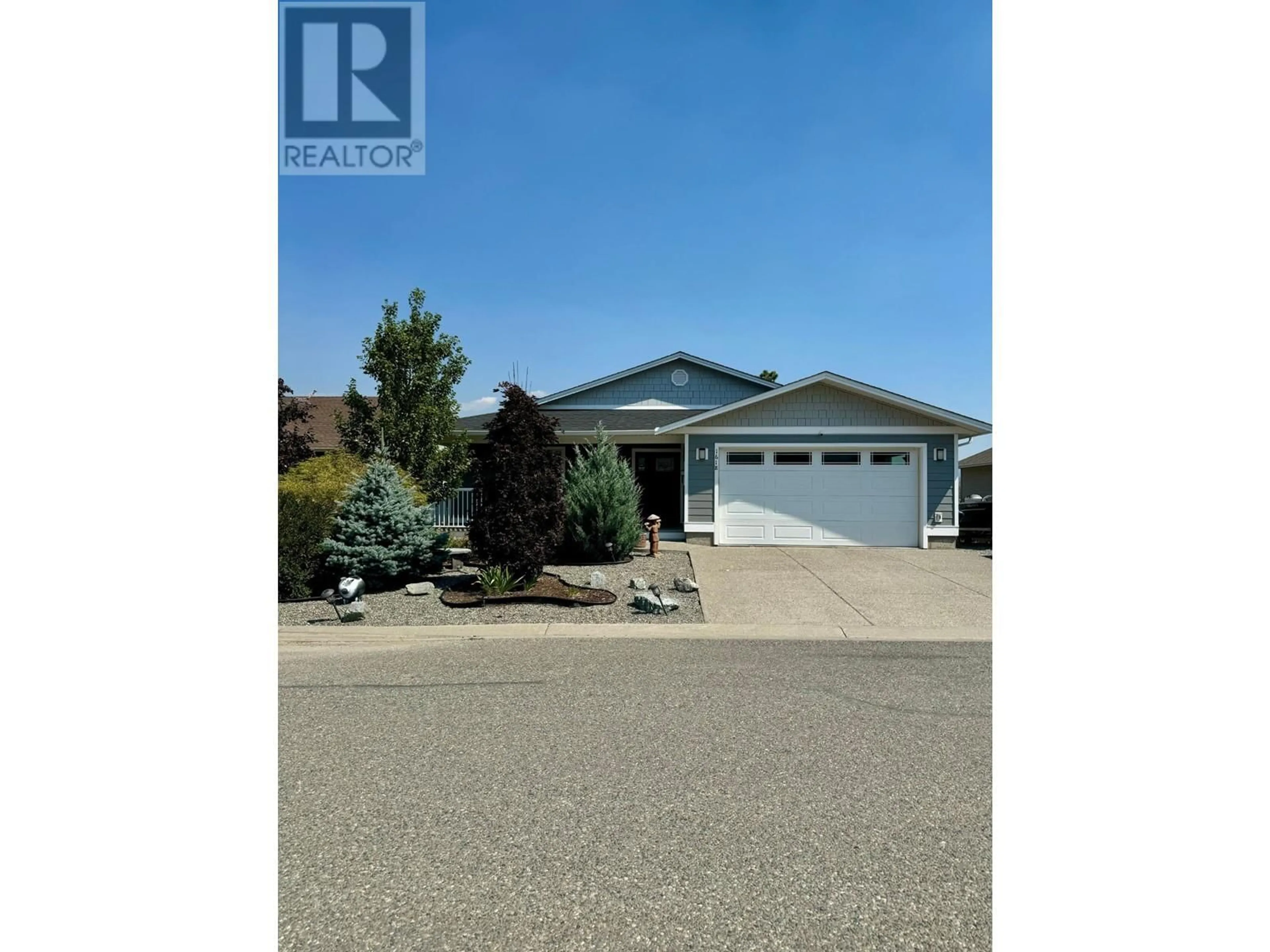 Frontside or backside of a home, the street view for 1618 FIR Road, Merritt British Columbia V1K1A0