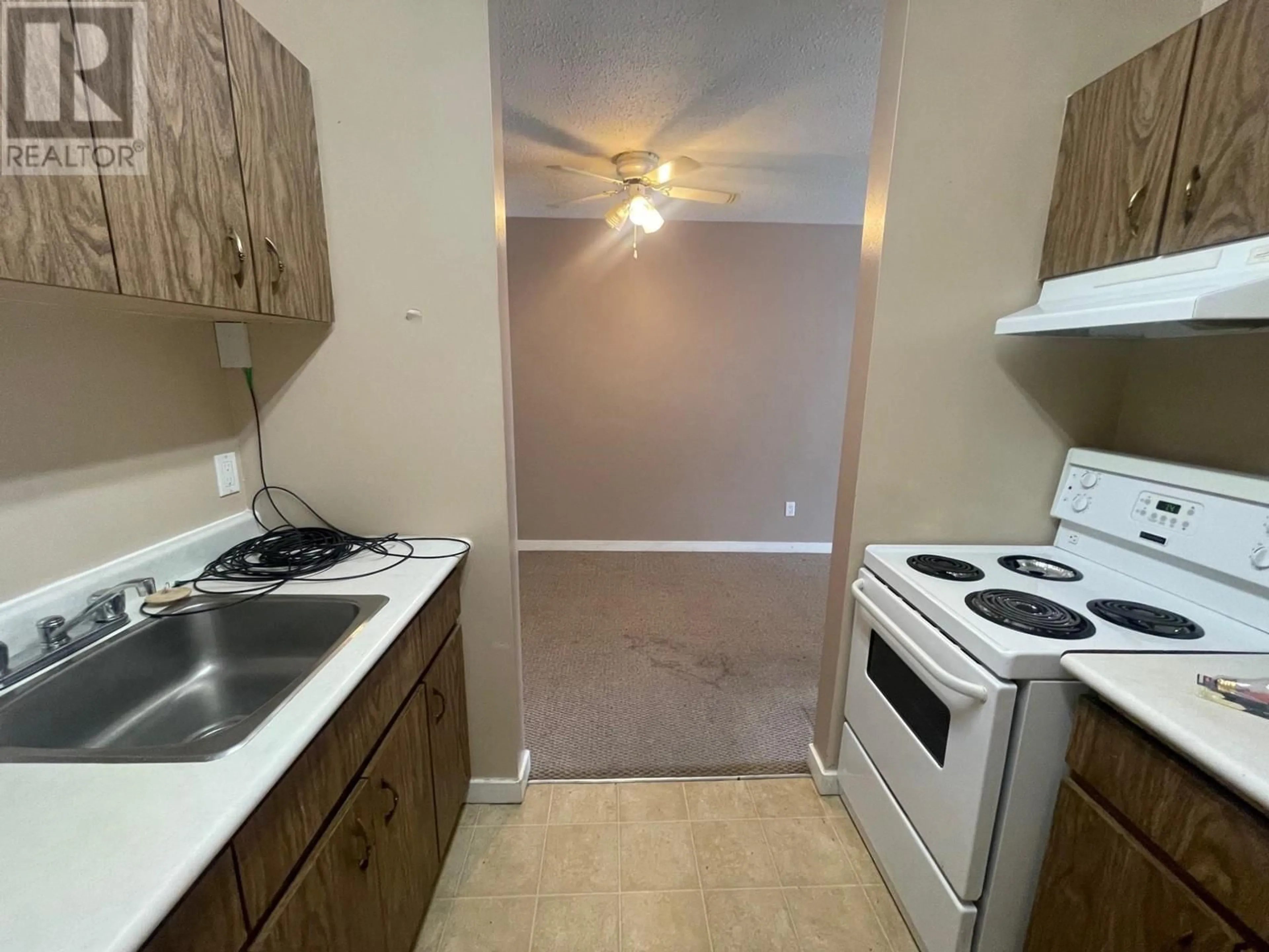 Standard kitchen, unknown floor, cottage for 1703 MENZIES Street Unit# 204, Merritt British Columbia V1K1A6