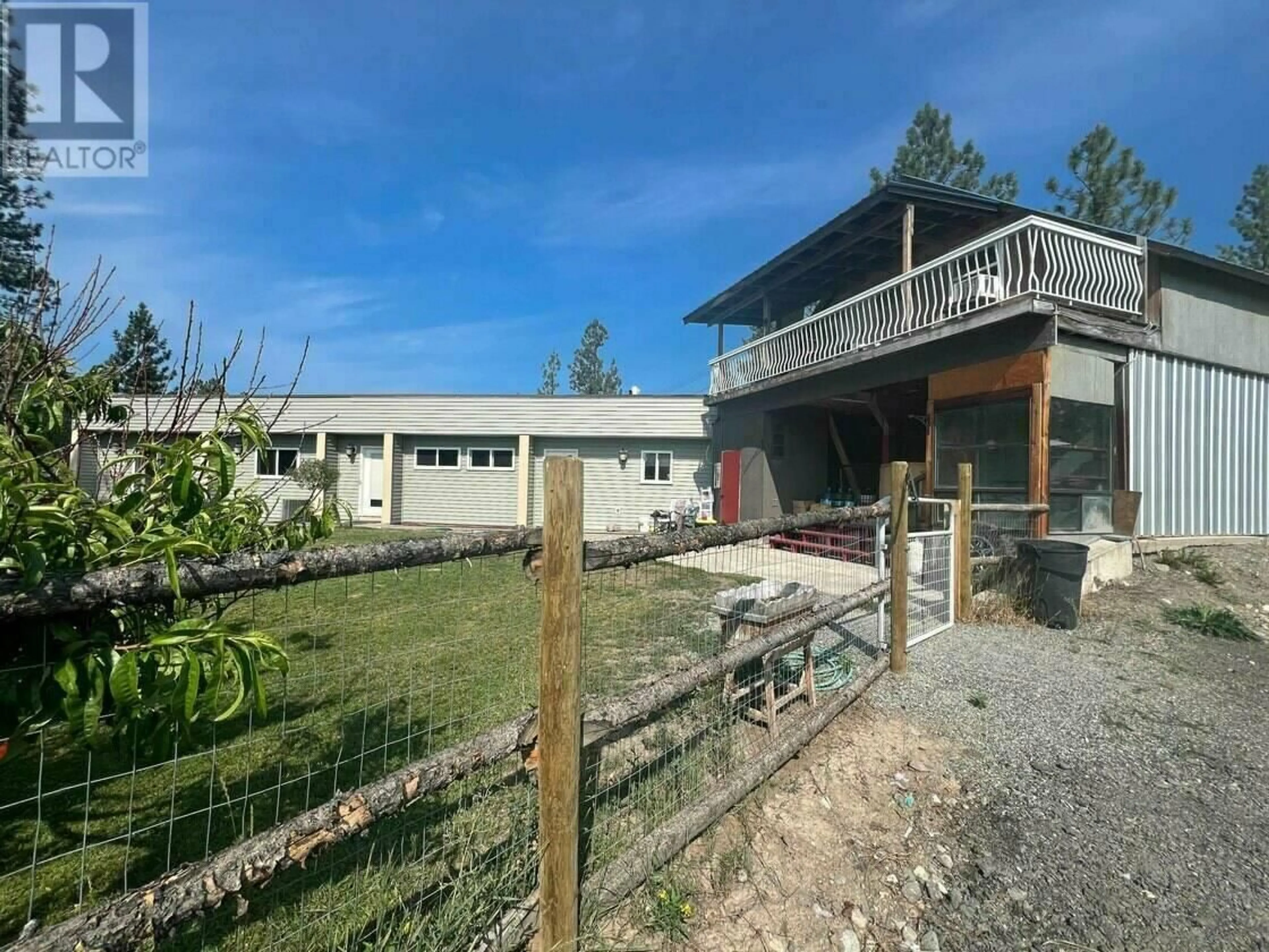 A pic from outside/outdoor area/front of a property/back of a property/a pic from drone, building for 310 GUICHON AVENUE, Merritt British Columbia V0K1Y0