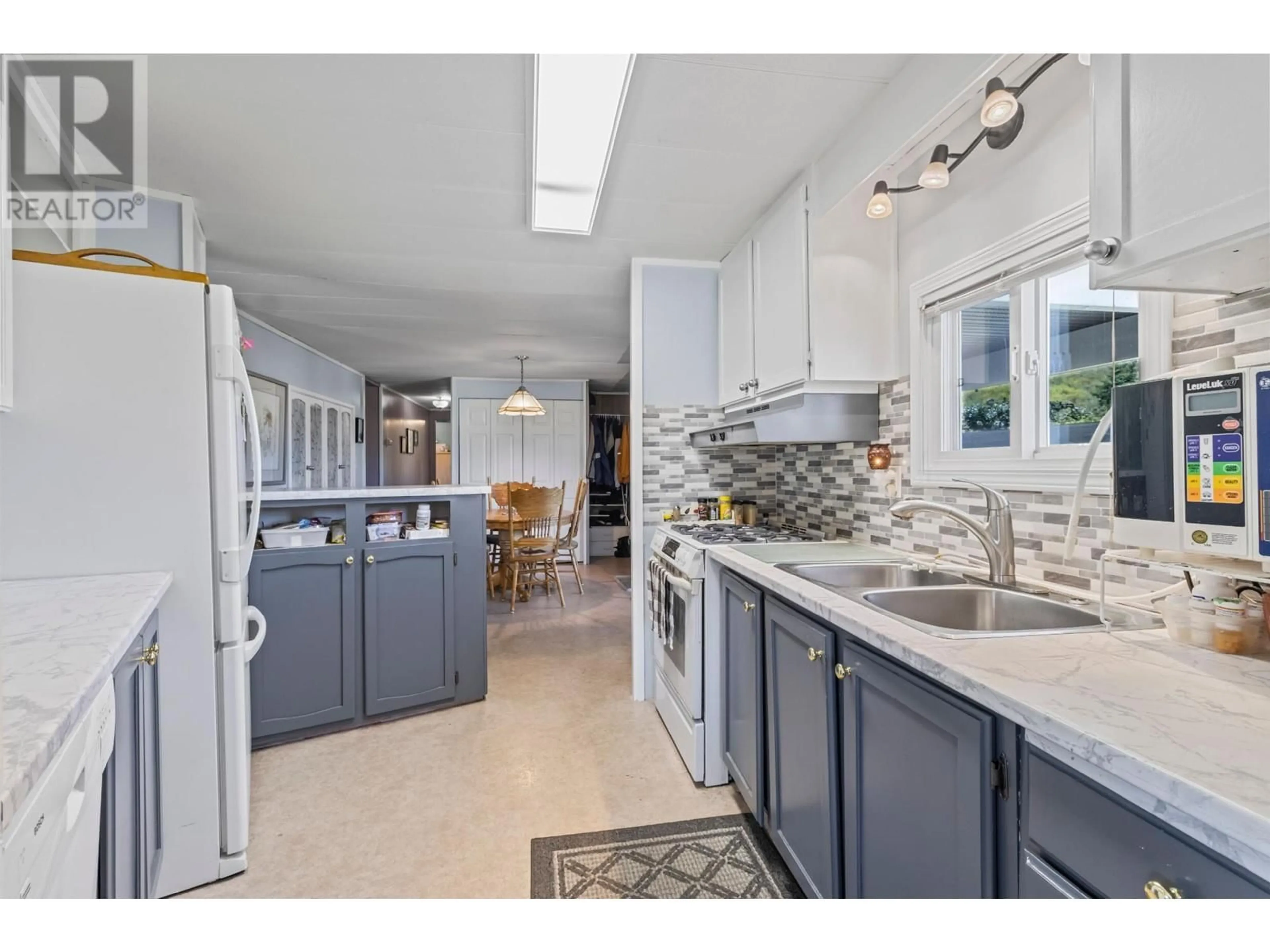 Open concept kitchen, ceramic/tile floor for 6150 TRANS CANADA HIGHWAY, Chase British Columbia V0E1M0