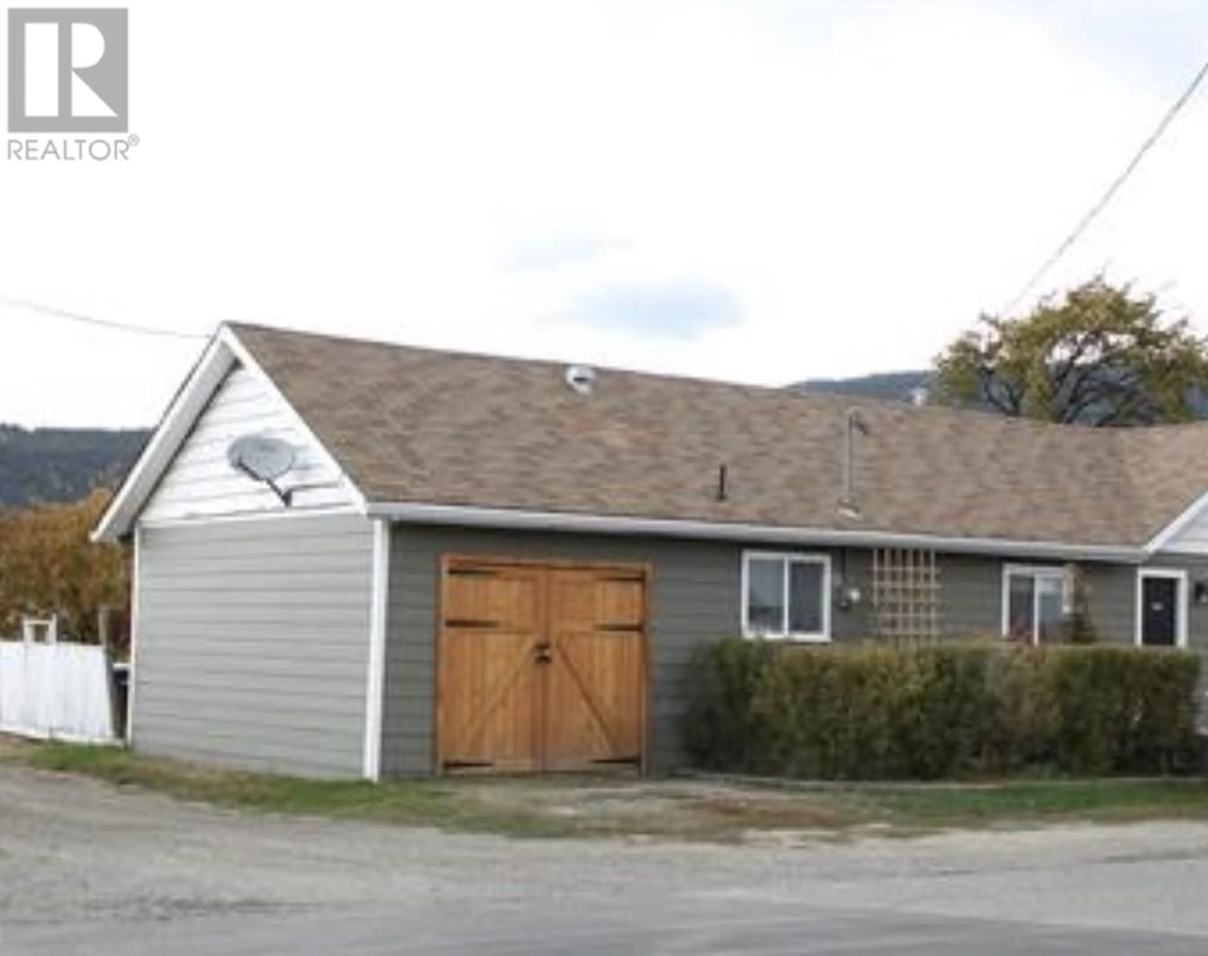 Frontside or backside of a home, the front or back of building for 1881 MAY Street, Merritt British Columbia V1K1B8