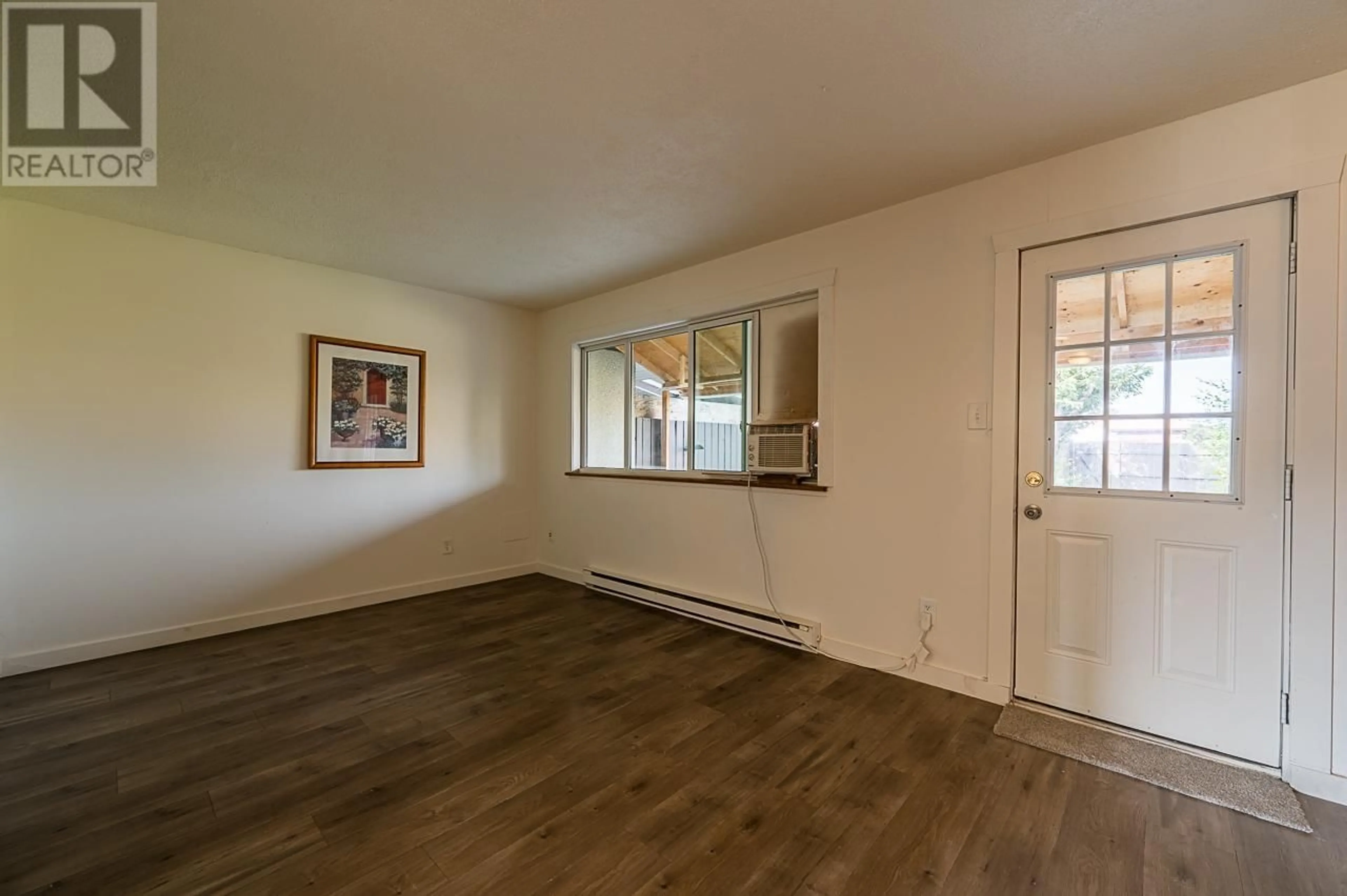 A pic of a room, wood floors for 1697 GREENFIELD Avenue Unit# 20, Kamloops British Columbia V2B4N5