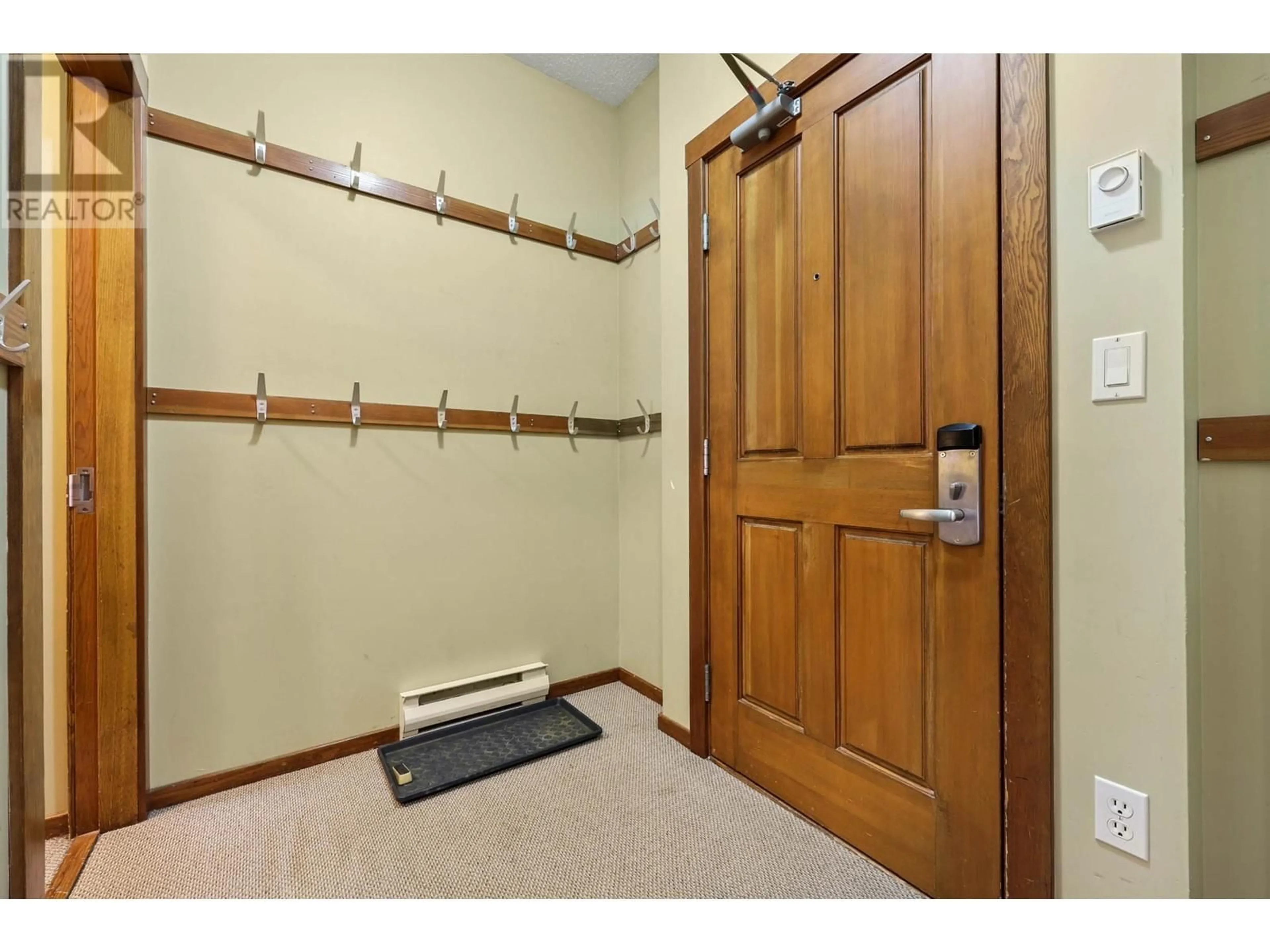 Indoor entryway, wood floors for 102-3190 CREEKSIDE WAY, Sun Peaks British Columbia