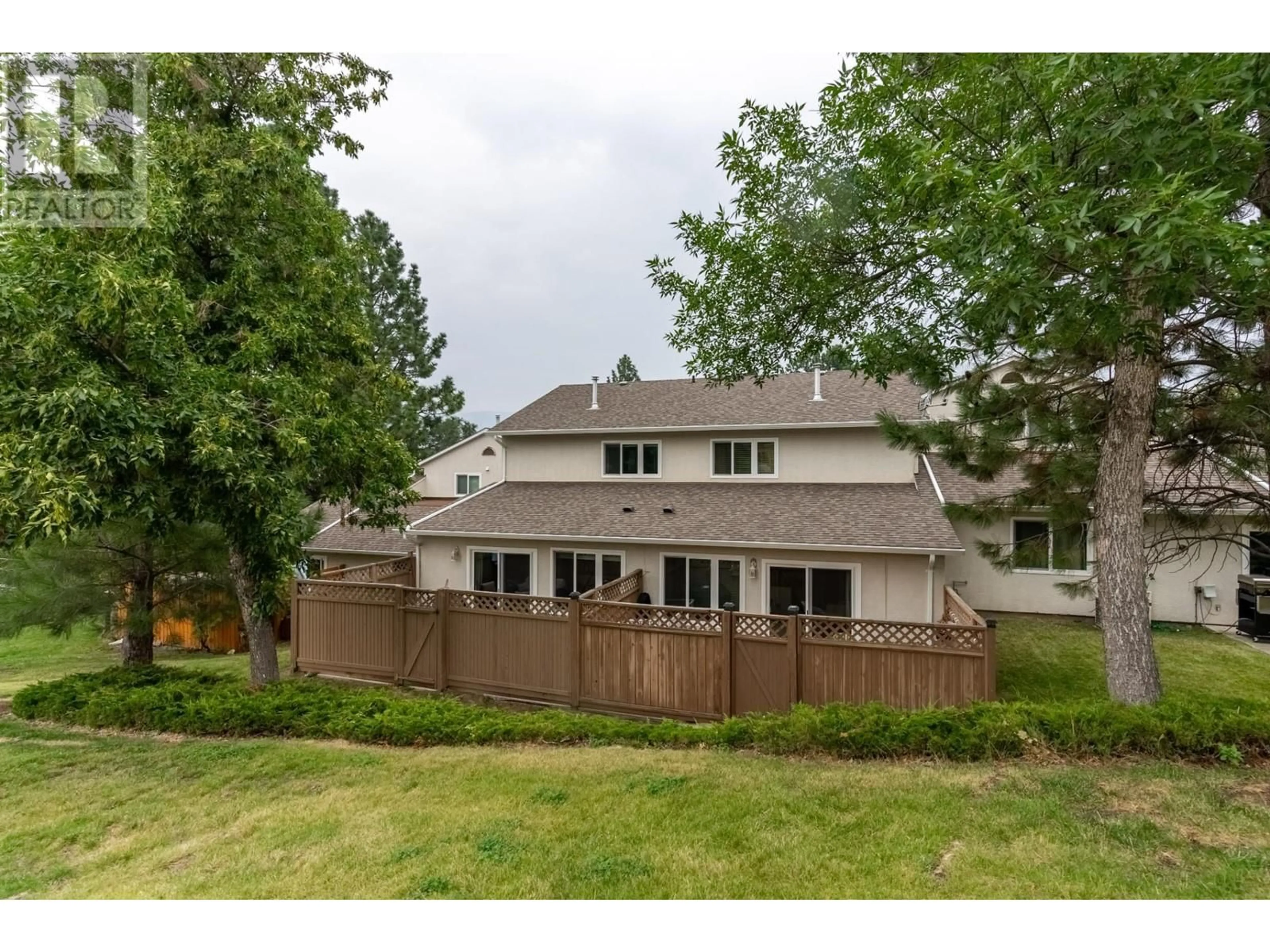 Frontside or backside of a home, the fenced backyard for 2050 QU'APPELLE Boulevard Unit# 24, Kamloops British Columbia V2E2R4