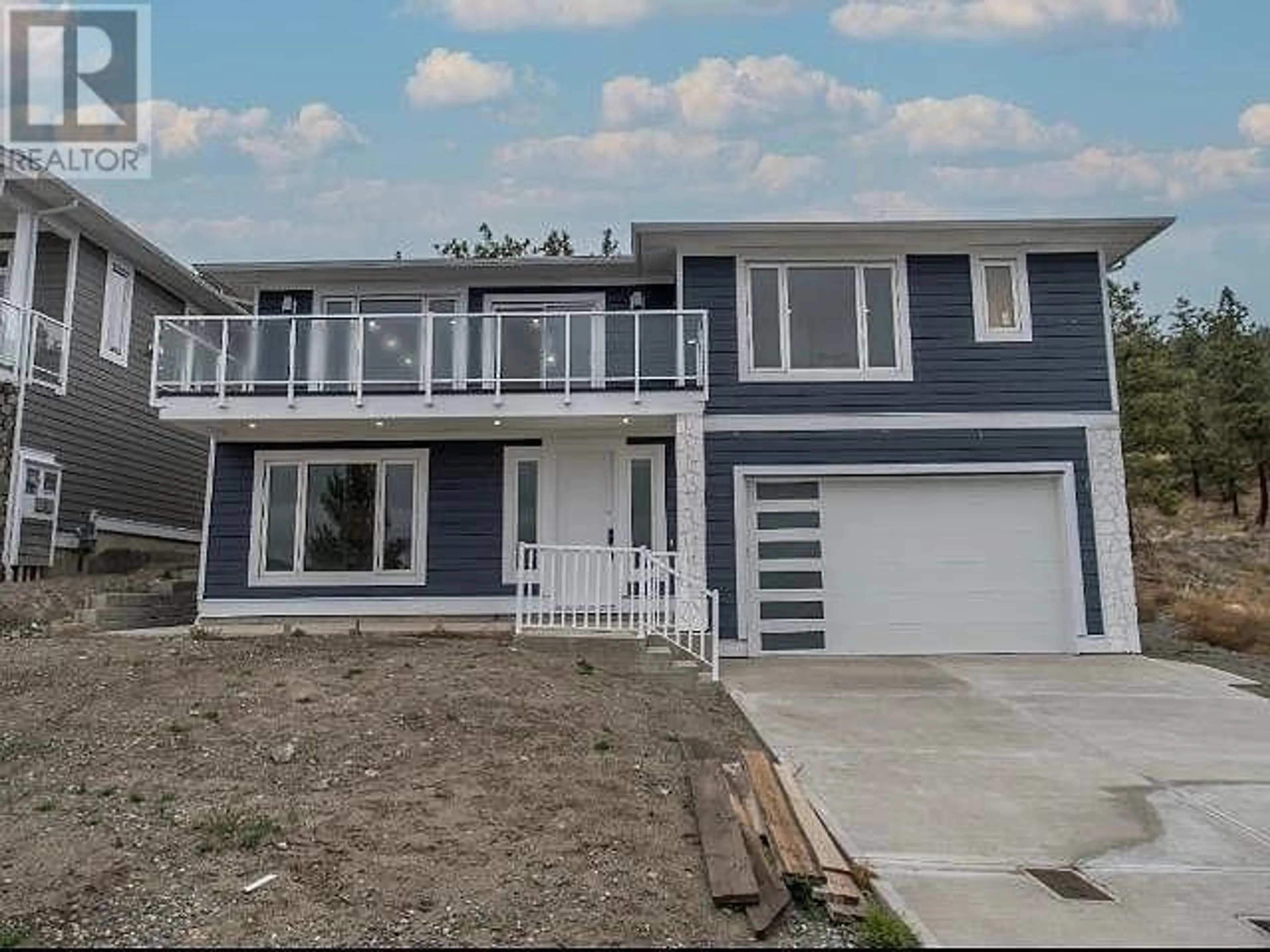 Frontside or backside of a home for 2737 PEREGRINE WAY, Merritt British Columbia V1K0B3