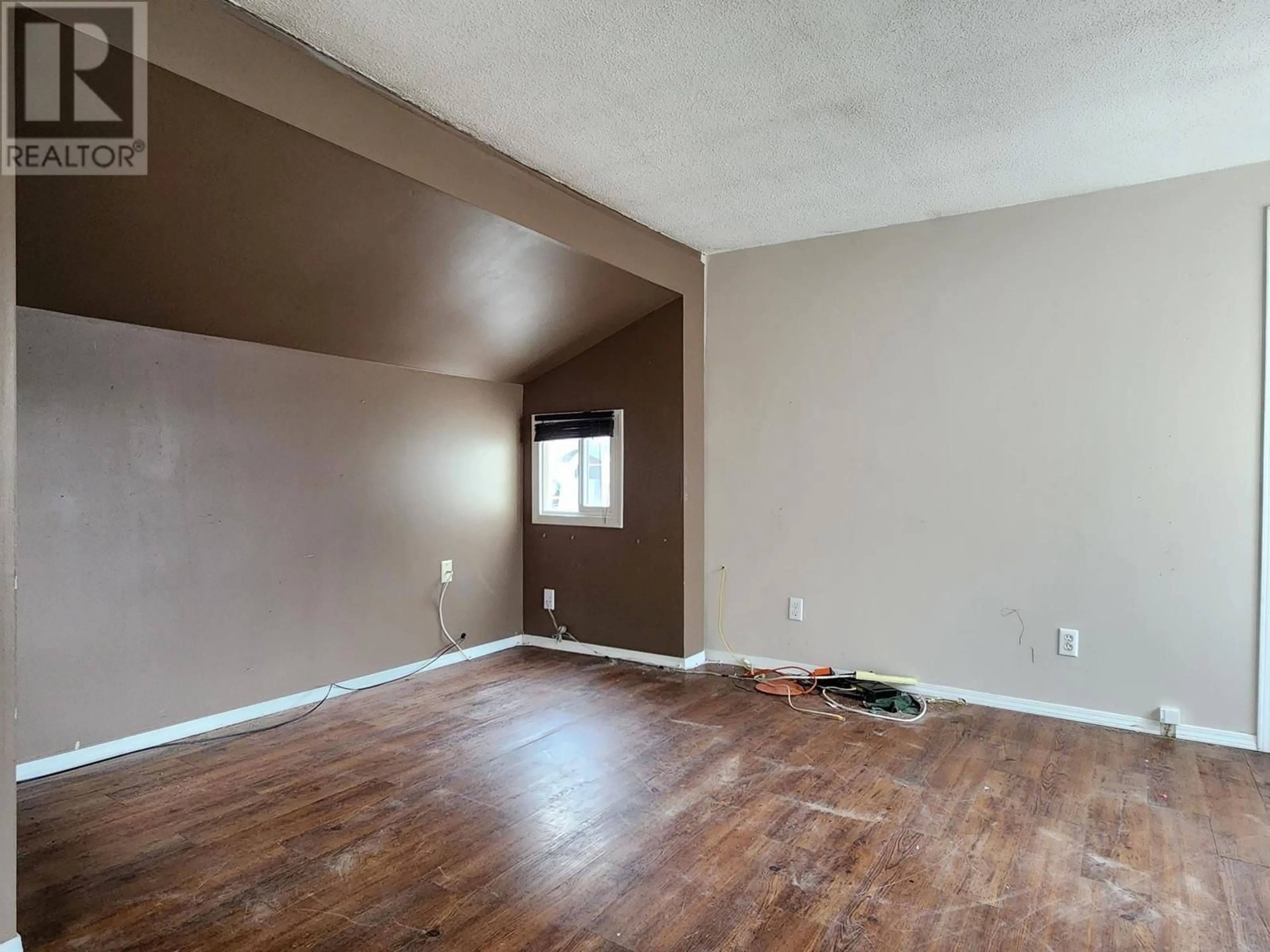 A pic of a room, wood floors for 1055 OLD CARIBOO Road Unit# 14, Cache Creek British Columbia V0K1H0