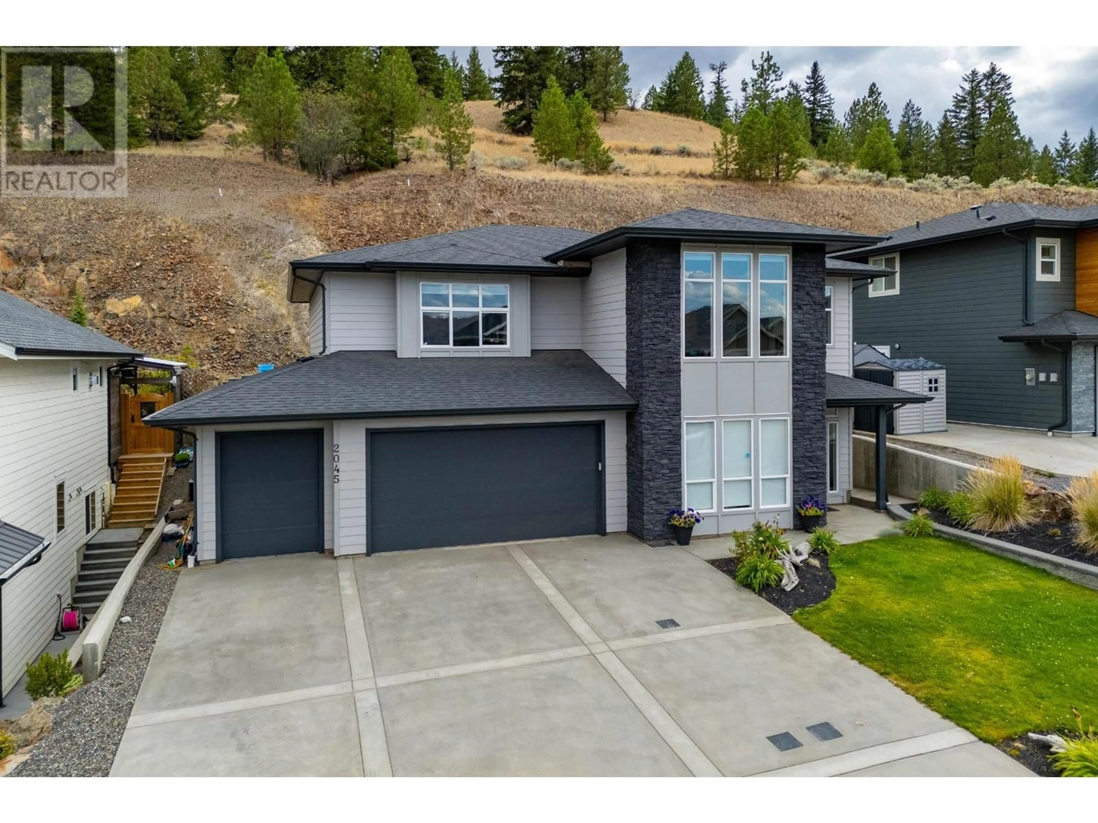 Frontside or backside of a home, the street view for 2045 GALORE Crescent, Kamloops British Columbia V2E0A7