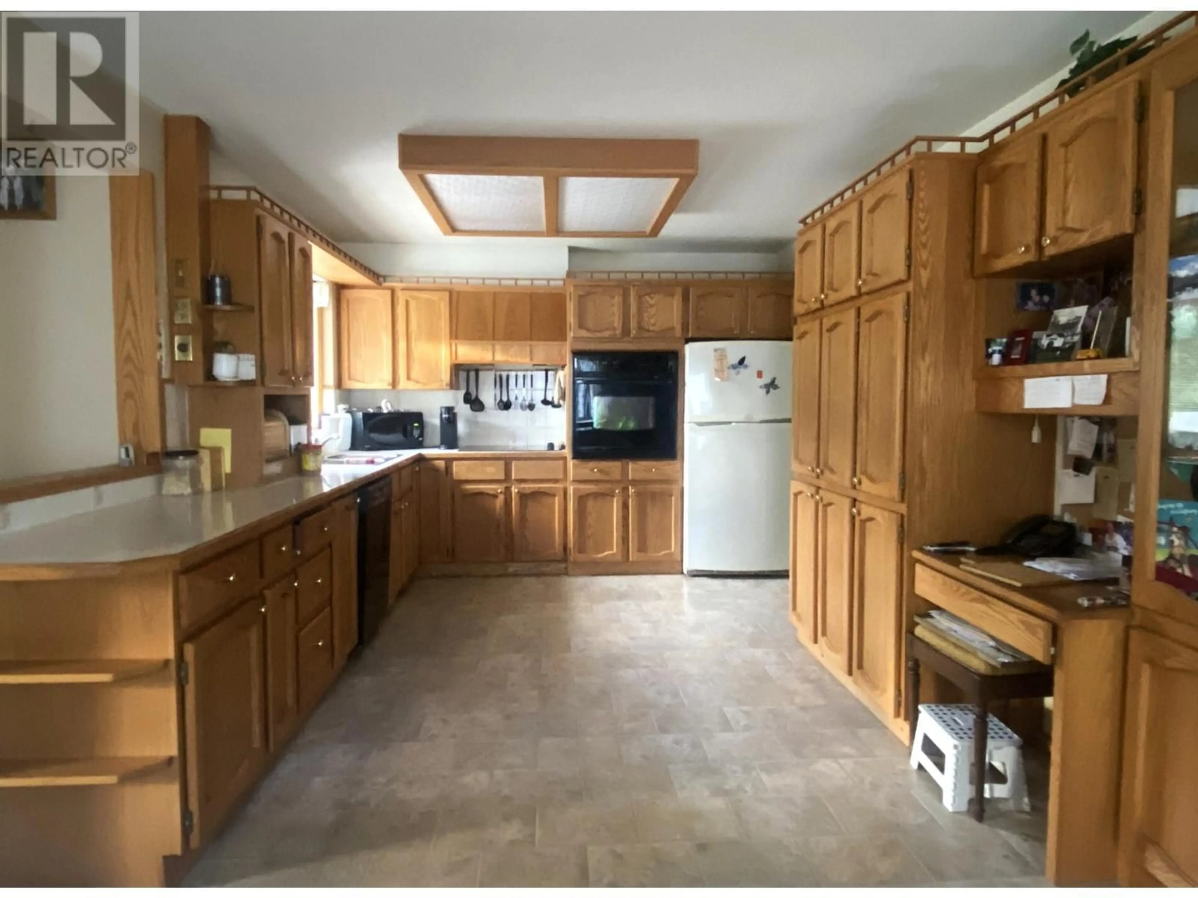 Kitchen, wood floors, cottage for 2265 CLEASBY Street, Merritt British Columbia V1K1R6