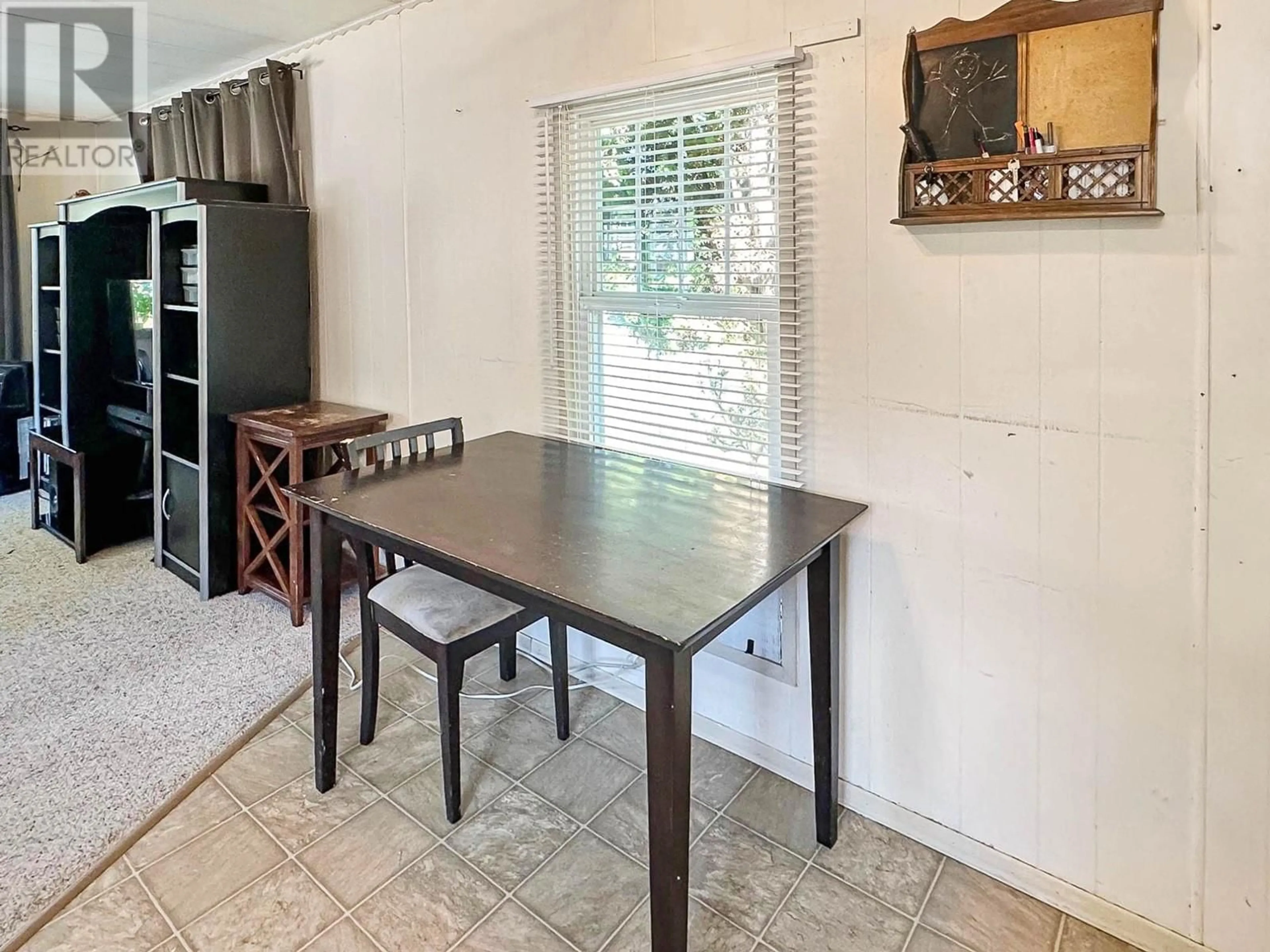 Dining room, wood floors, cottage for 1175 ROSE HILL Road Unit# 44, Kamloops British Columbia V2E1G9