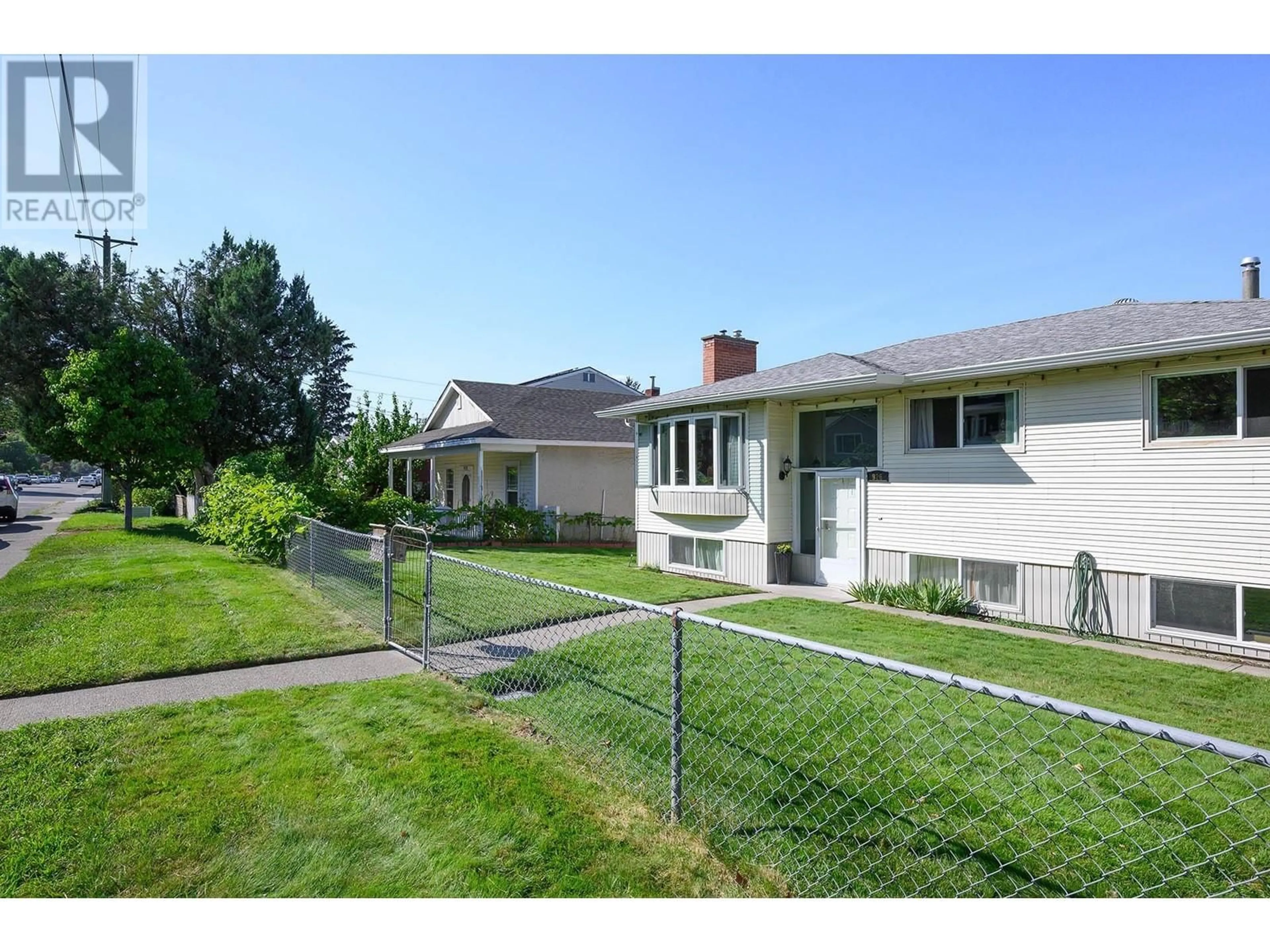 Frontside or backside of a home, the fenced backyard for 926 PINE Street, Kamloops British Columbia V2C3A2