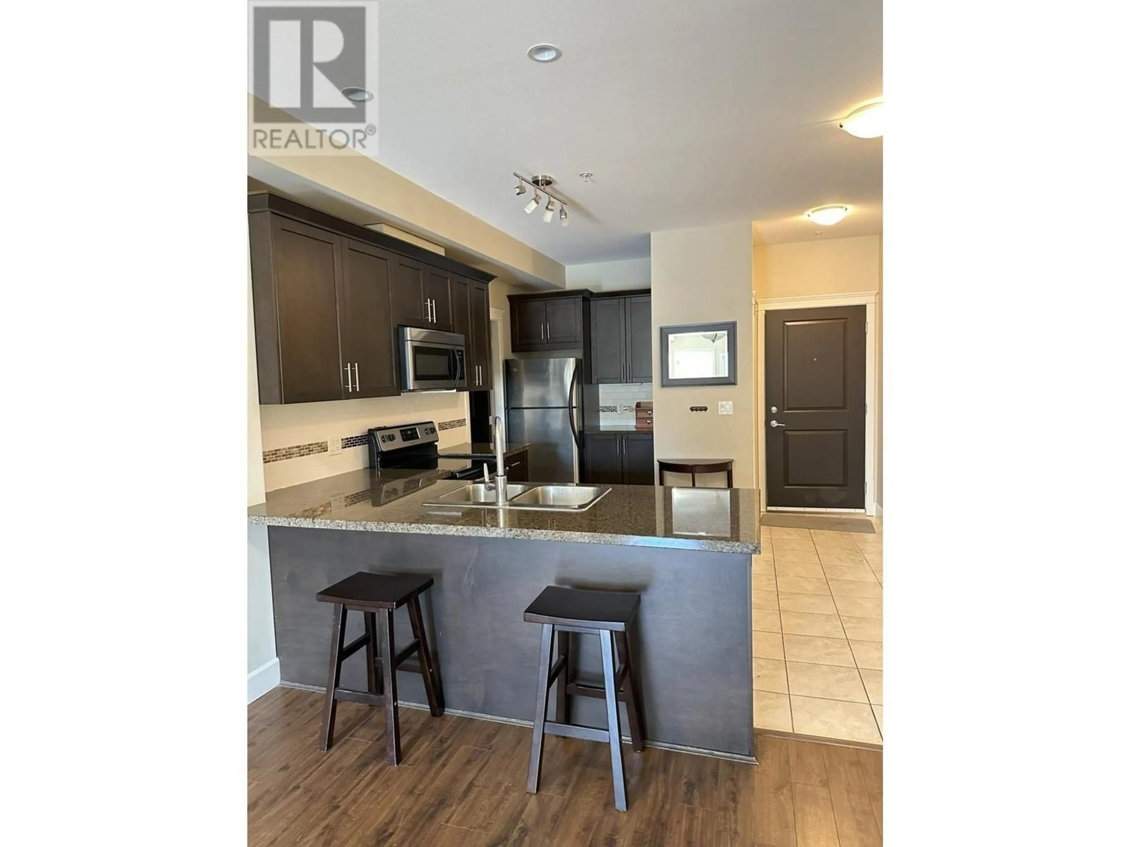 Open concept kitchen for 2799 CLAPPERTON Avenue Unit# 205, Merritt British Columbia V1K1A2