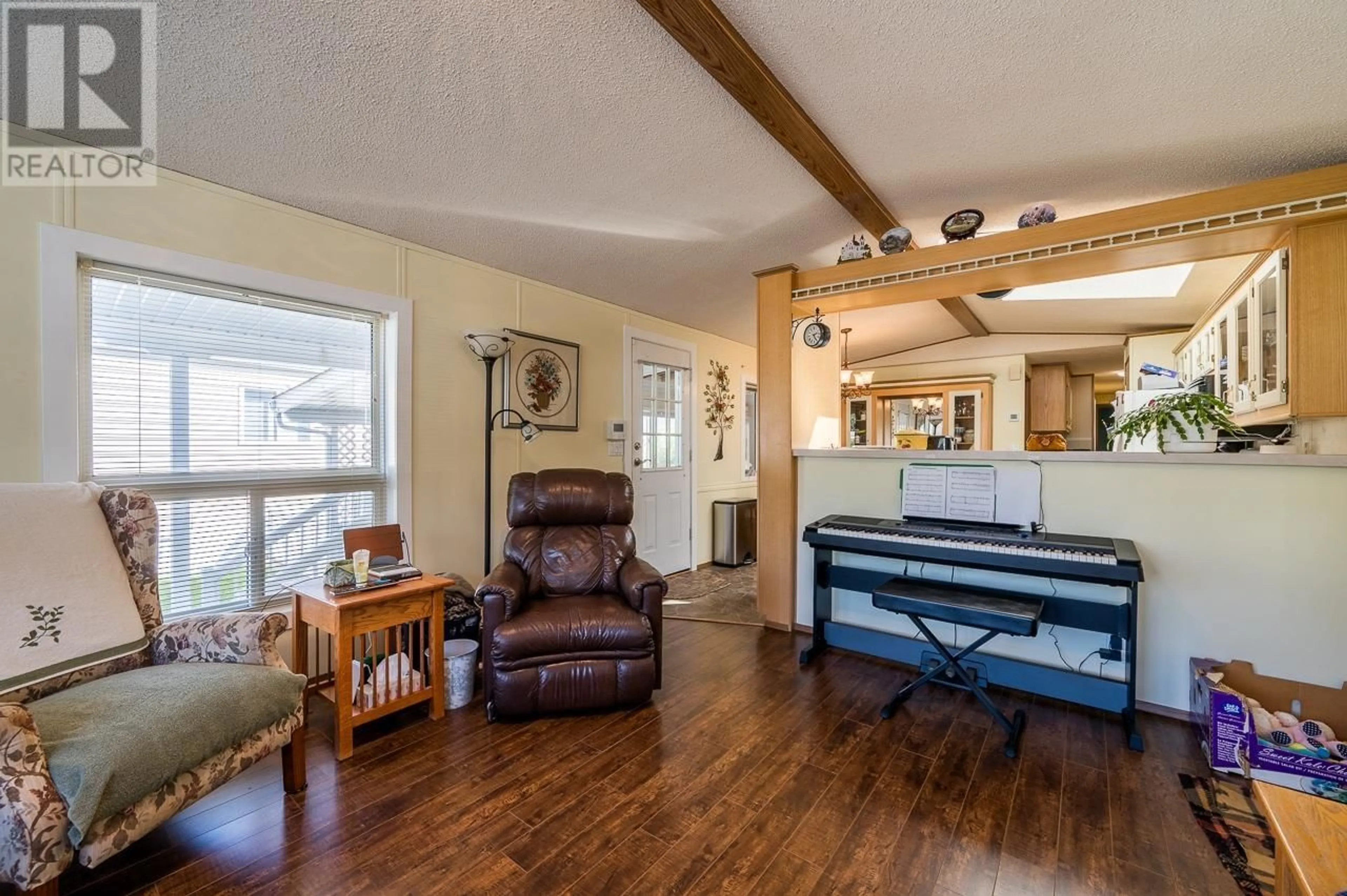 Living room, wood floors for 2400 OAKDALE Way Unit# 218, Kamloops British Columbia V2B6W7