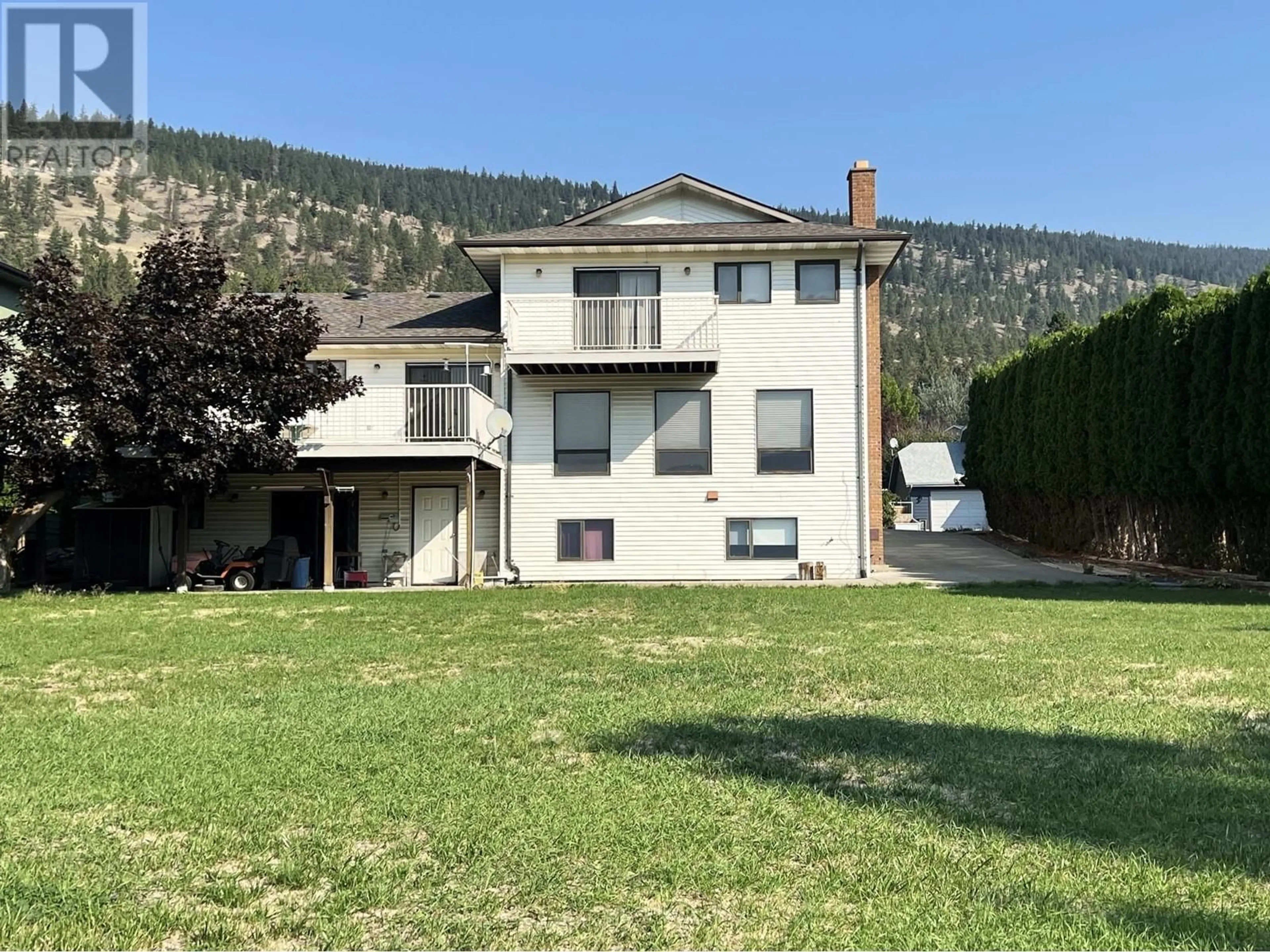 Frontside or backside of a home for 1826 JUNIPER DRIVE, Merritt British Columbia V1K1J6