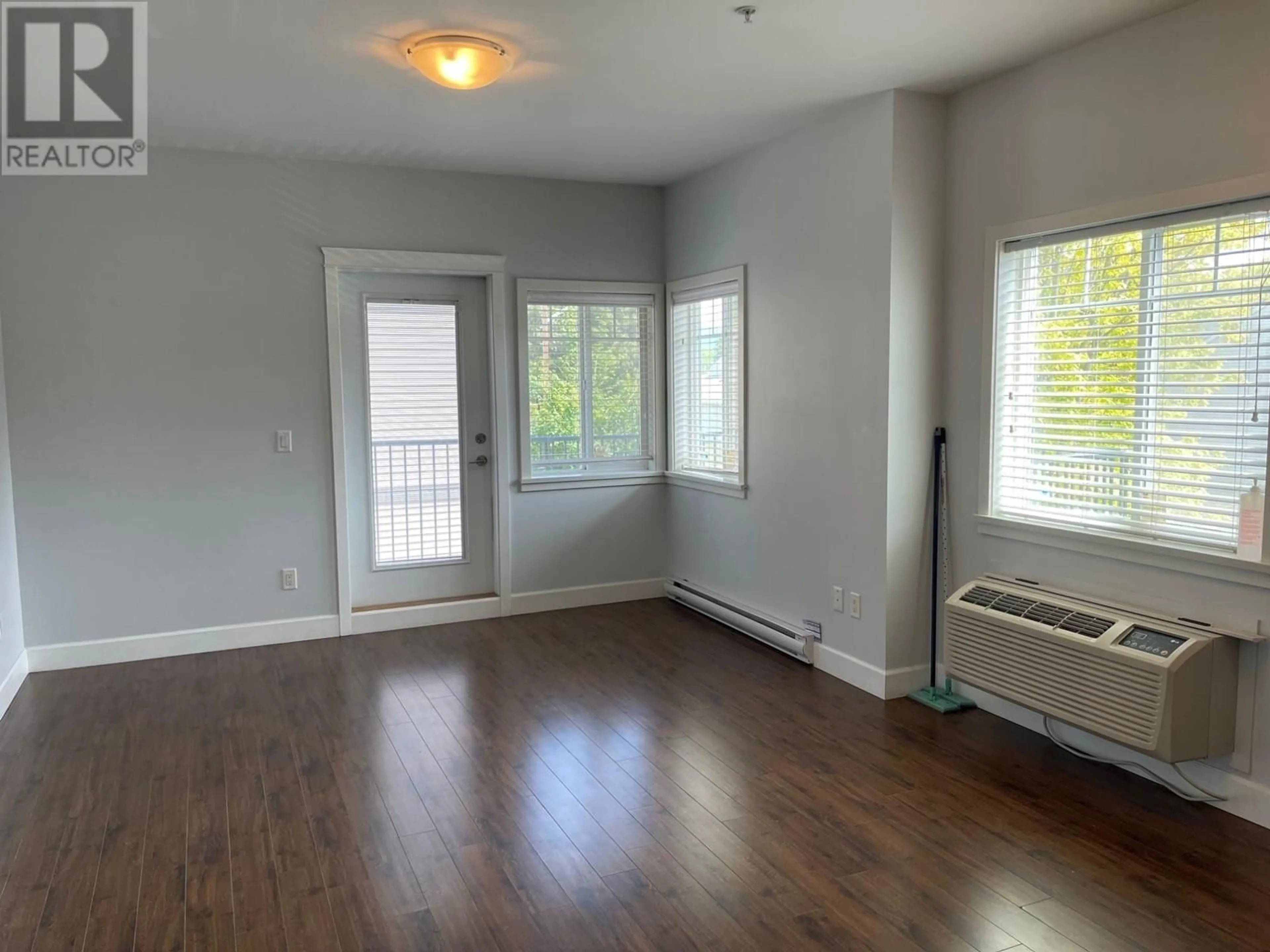 A pic of a room, wood floors for 2799 CLAPPERTON Avenue Unit# 203, Merritt British Columbia V1K1A2