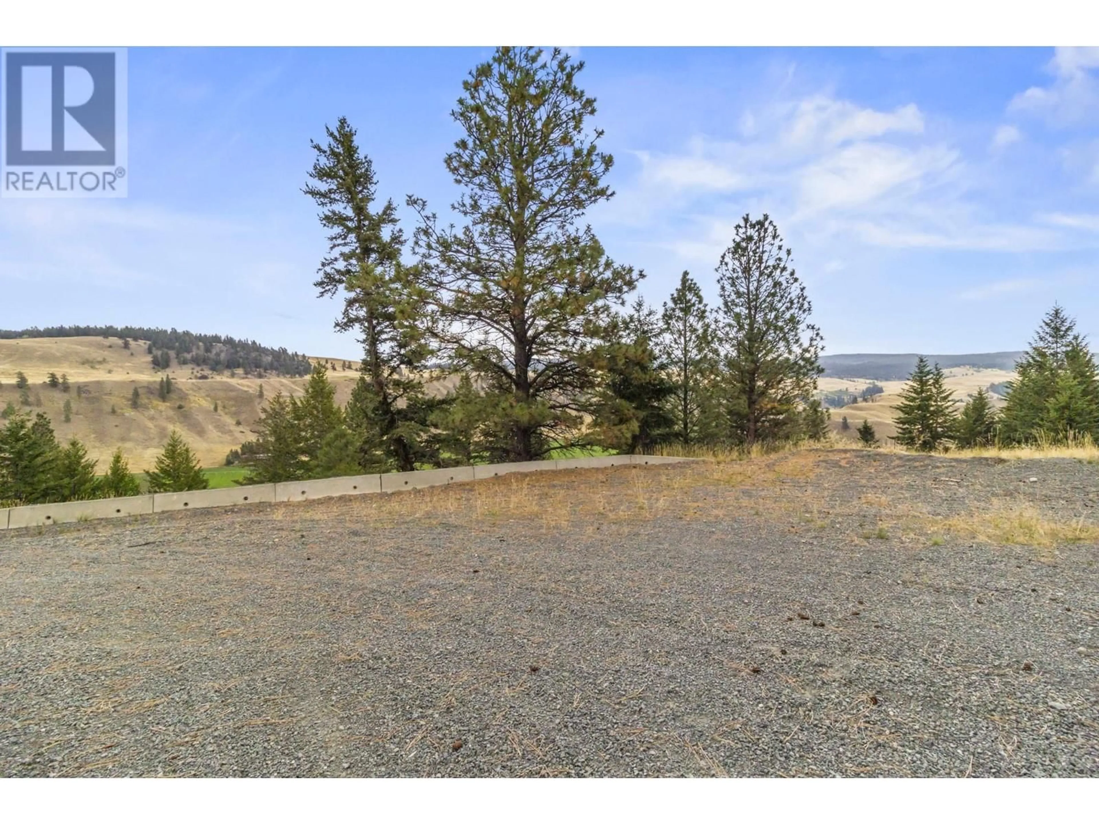 A pic from exterior of the house or condo, the fenced backyard for 5889 OLD STAGECOACH Road, Kamloops British Columbia V0E2A0