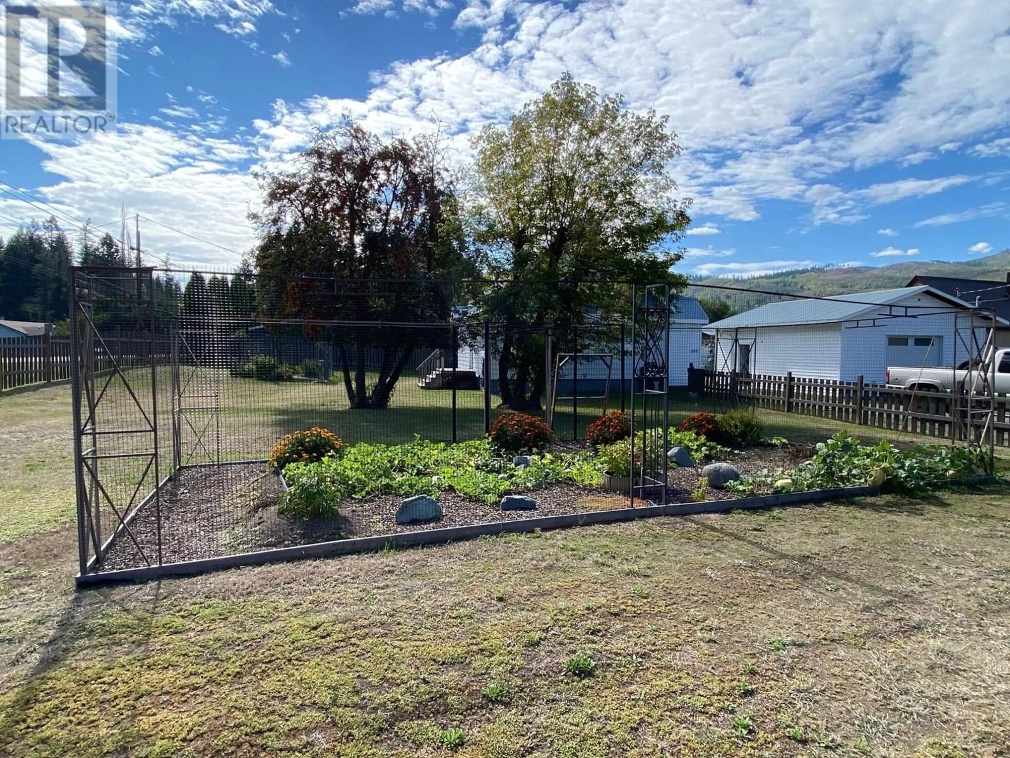 Patio, the fenced backyard for 580 STATION Road, Barriere British Columbia V0E1E0