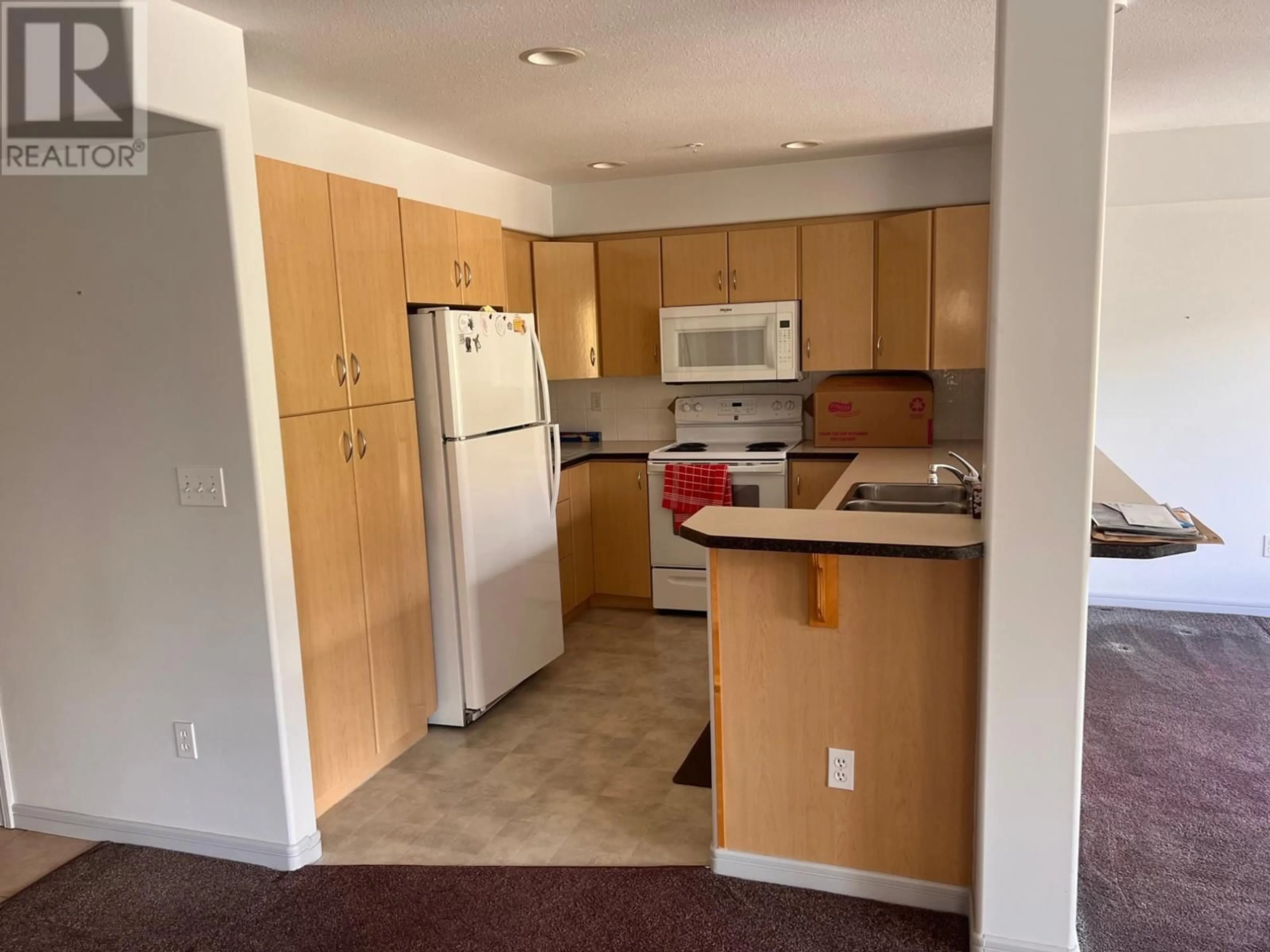 Standard kitchen, wood floors for 970 LORNE Street Unit# 208, Kamloops British Columbia V2H1T7