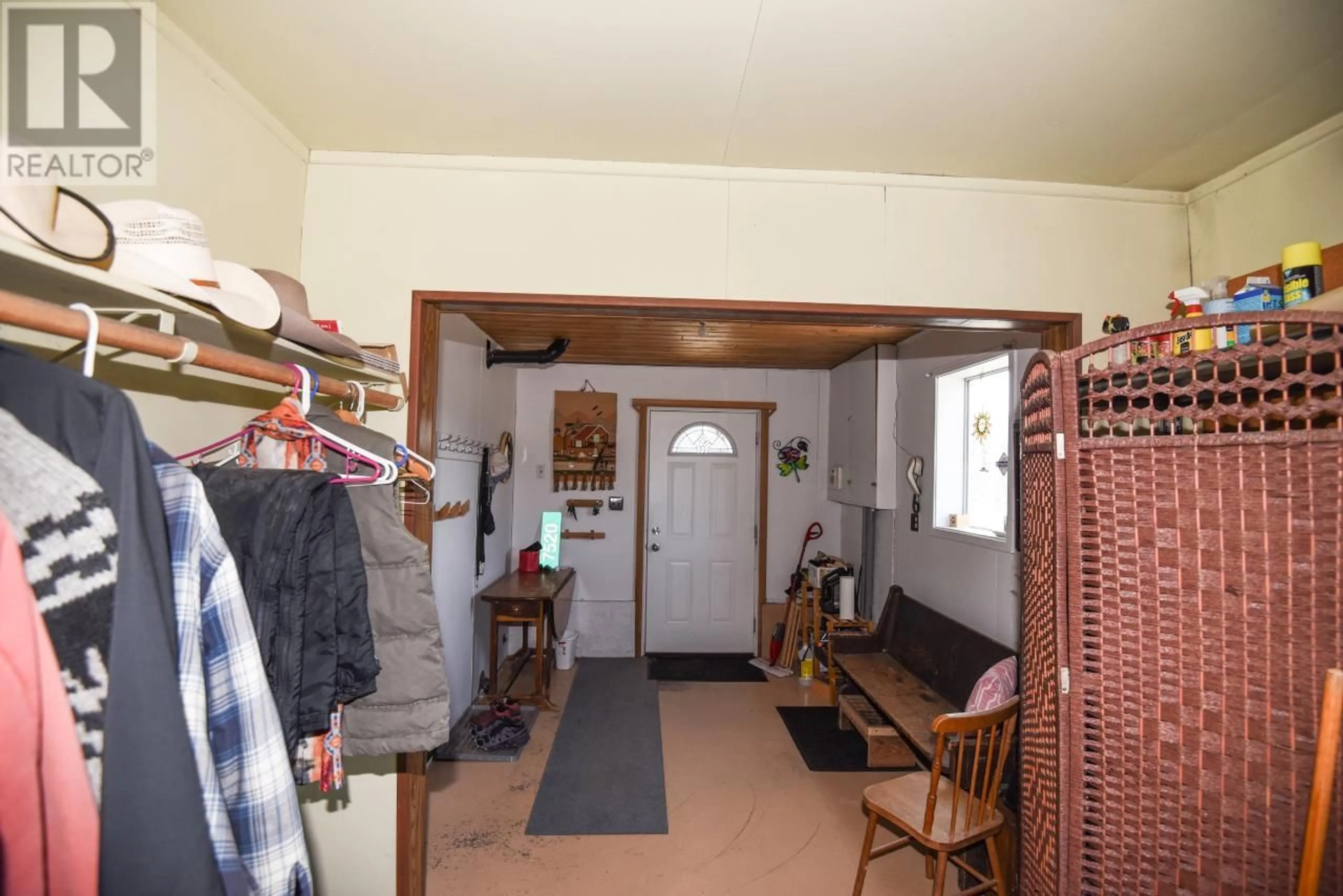 Indoor foyer, wood floors for 7520 WEST SUBDIVISION Road, Clinton British Columbia V0K1K0