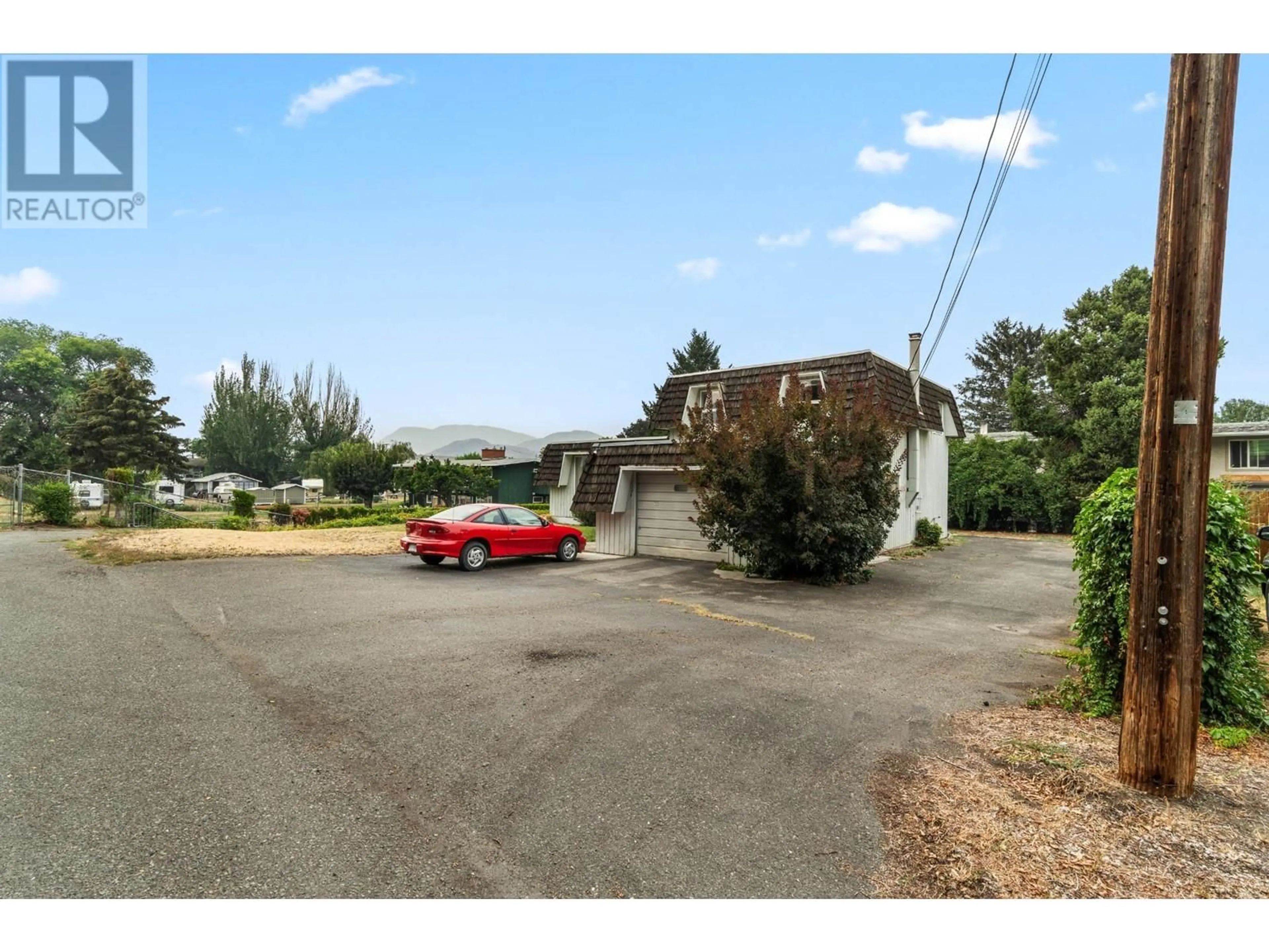 Frontside or backside of a home, the street view for 1344 KENORA Road, Kamloops British Columbia V2B3X7