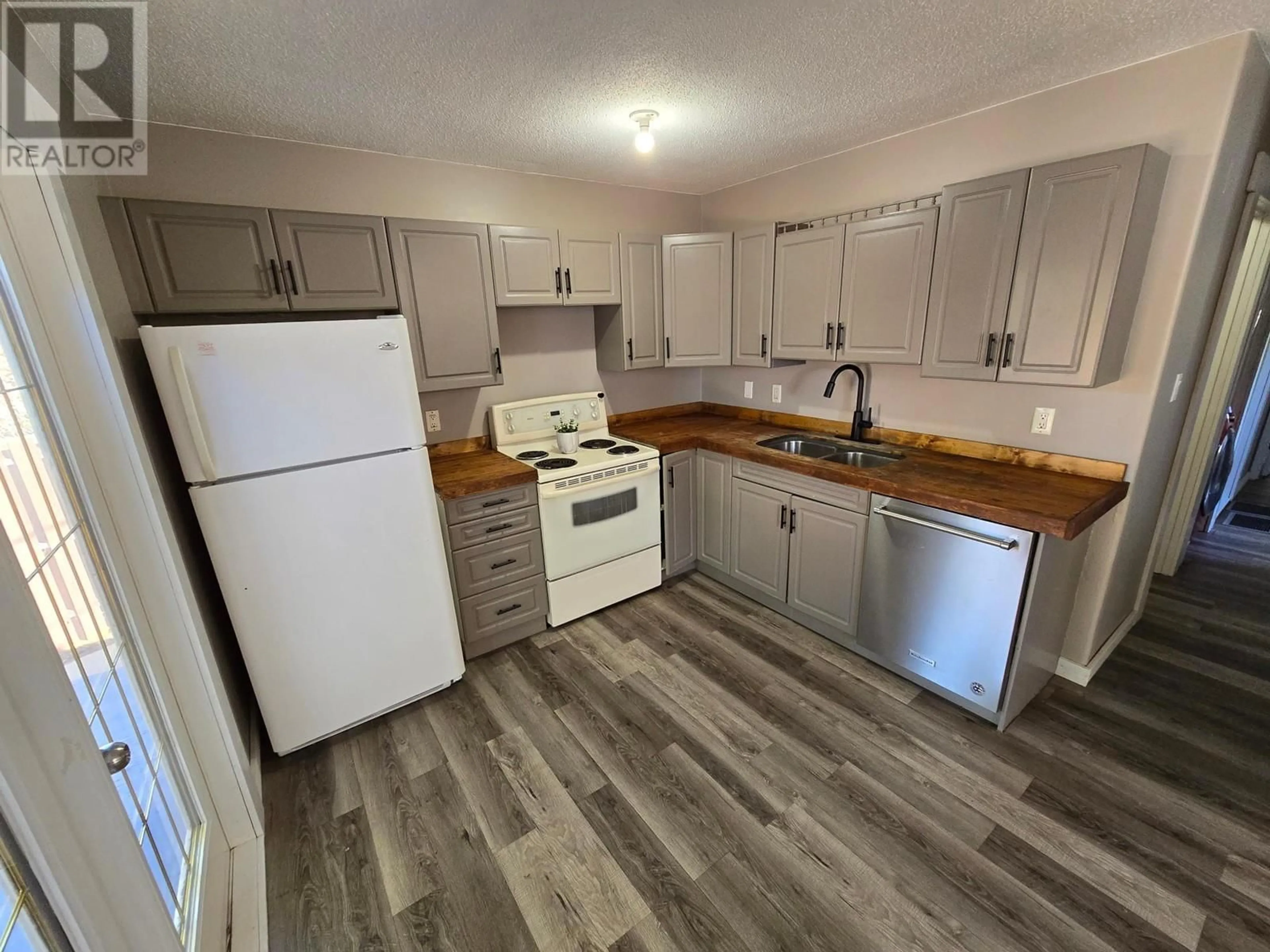 Standard kitchen, wood floors, cottage for 357 HELMCKEN Street, Clearwater British Columbia V0E1N1