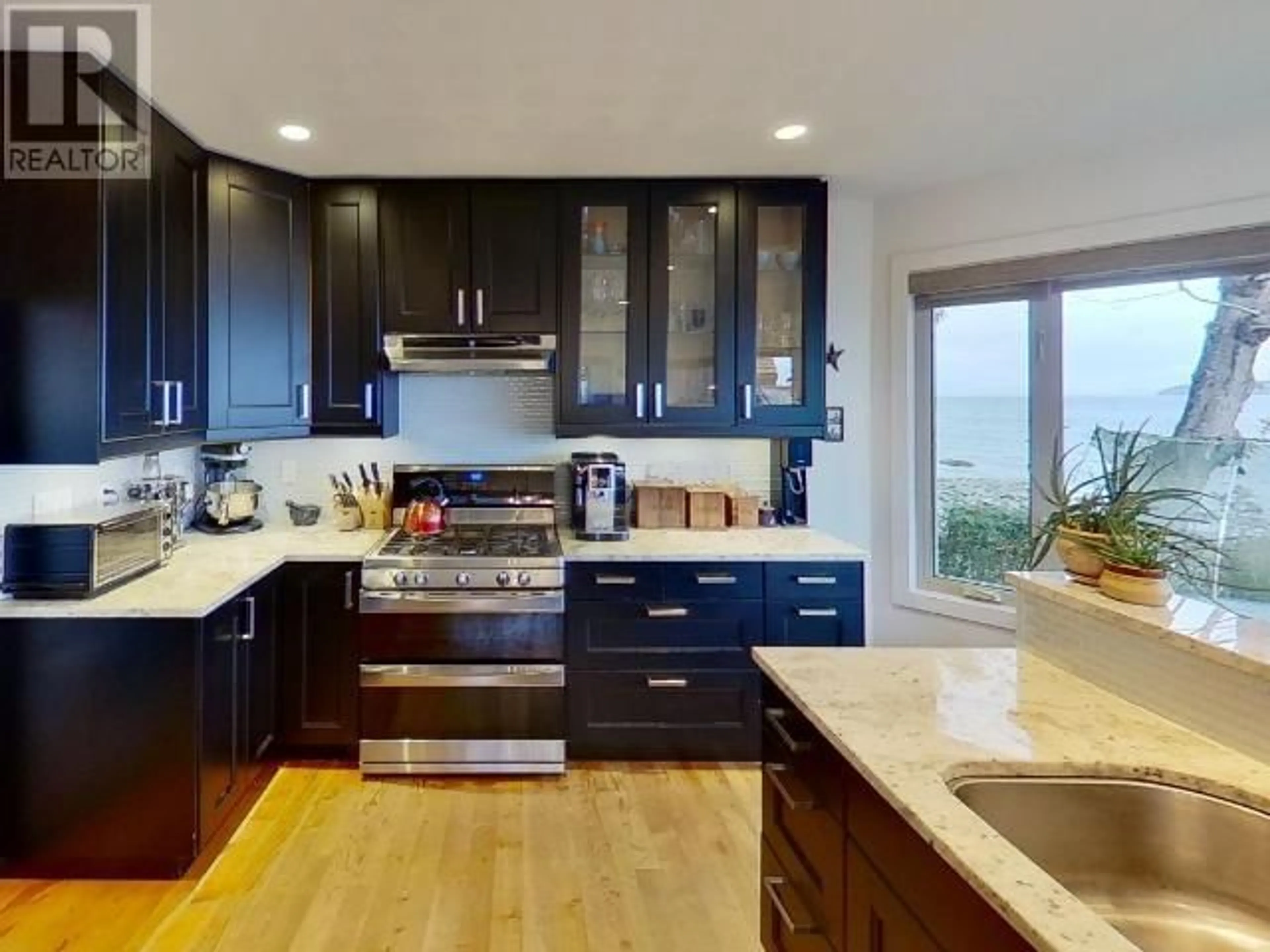 Contemporary kitchen, wood floors for 3311 ATREVIDA ROAD, Powell River British Columbia V8A0E1