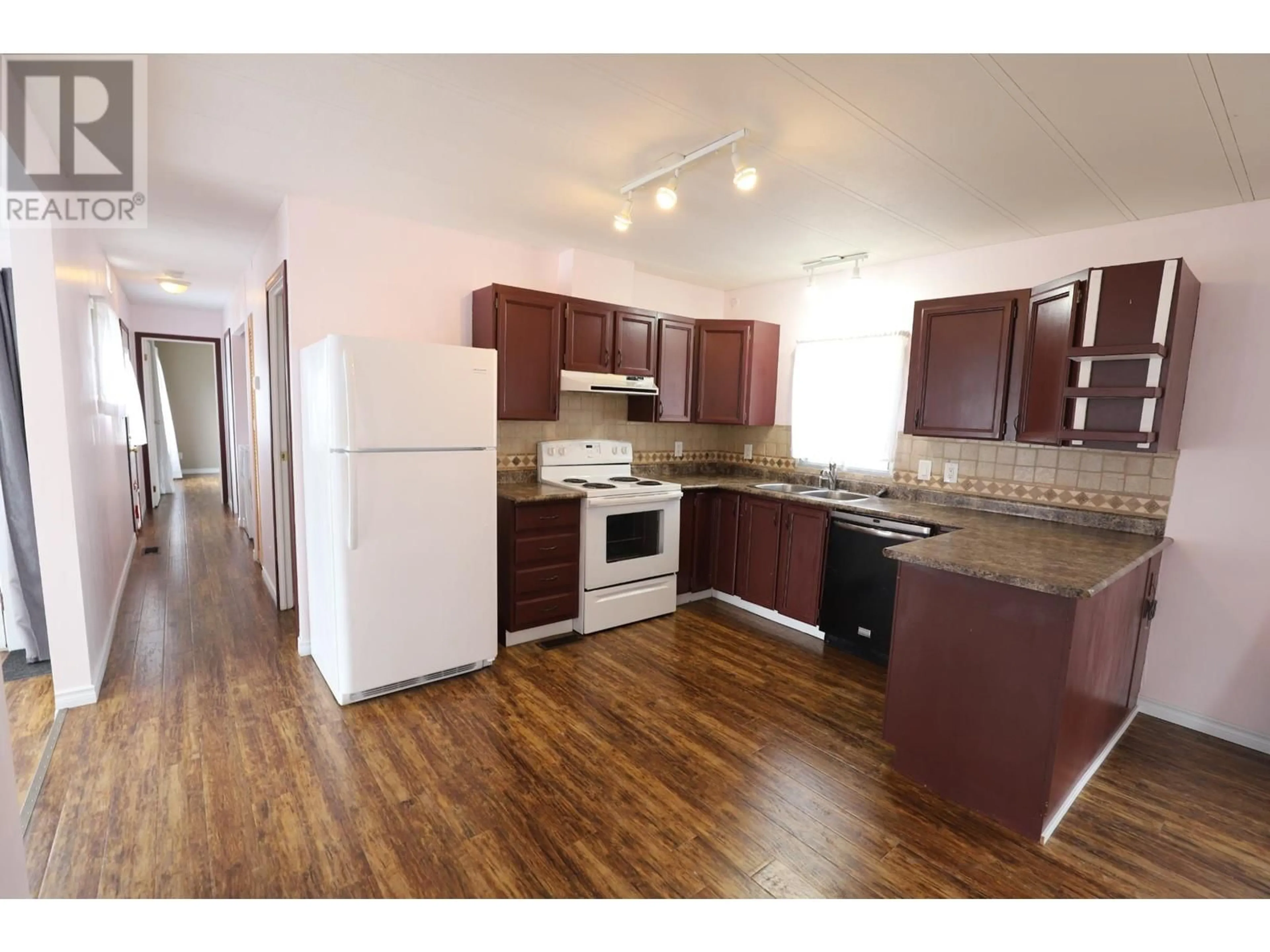 Standard kitchen, wood floors for 254 MERRITT SPENCES BR Highway Unit# 6B, Merritt British Columbia V0K1Y0