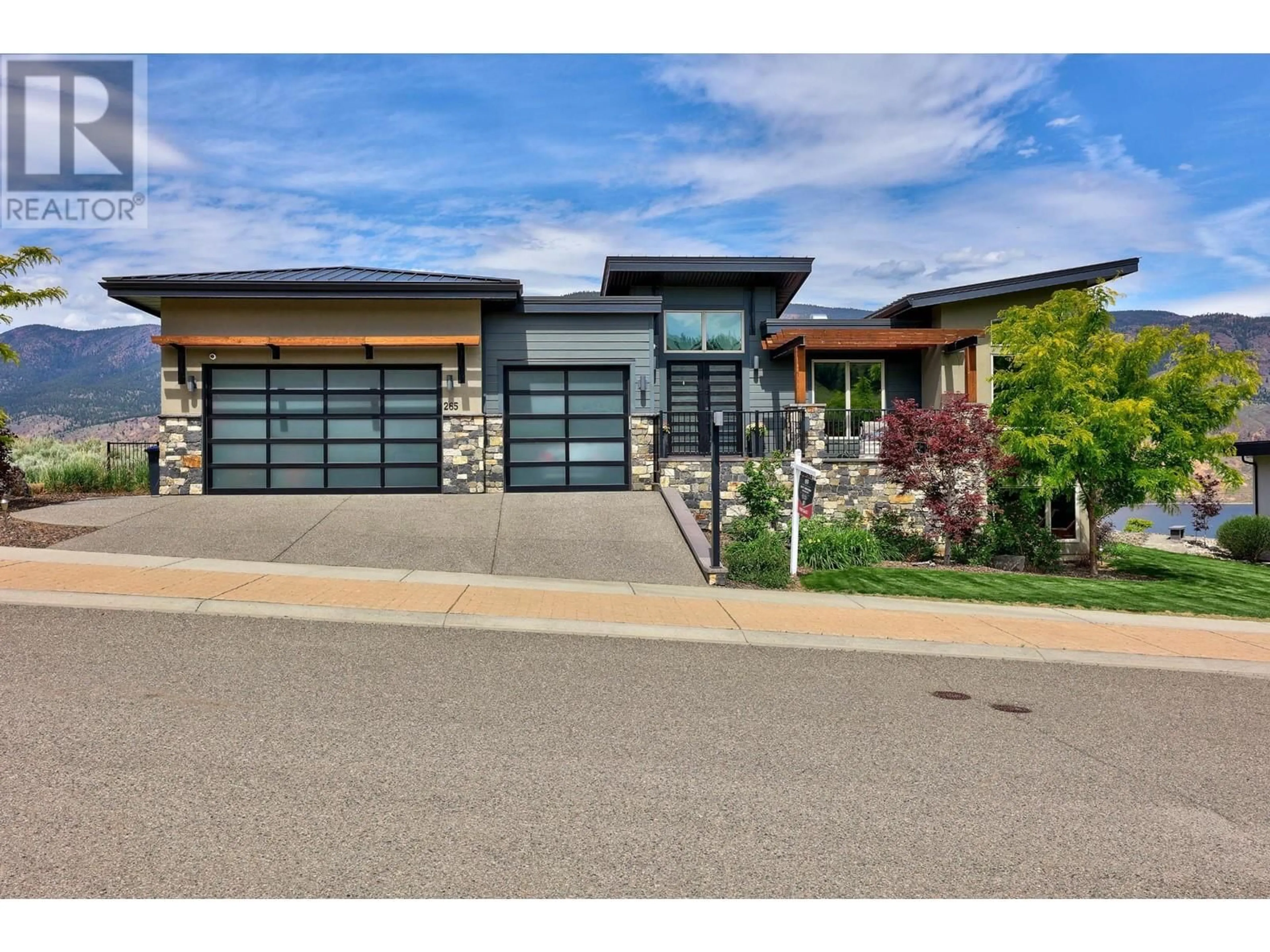 Home with brick exterior material for 265 HOLLOWAY DRIVE, Tobiano British Columbia