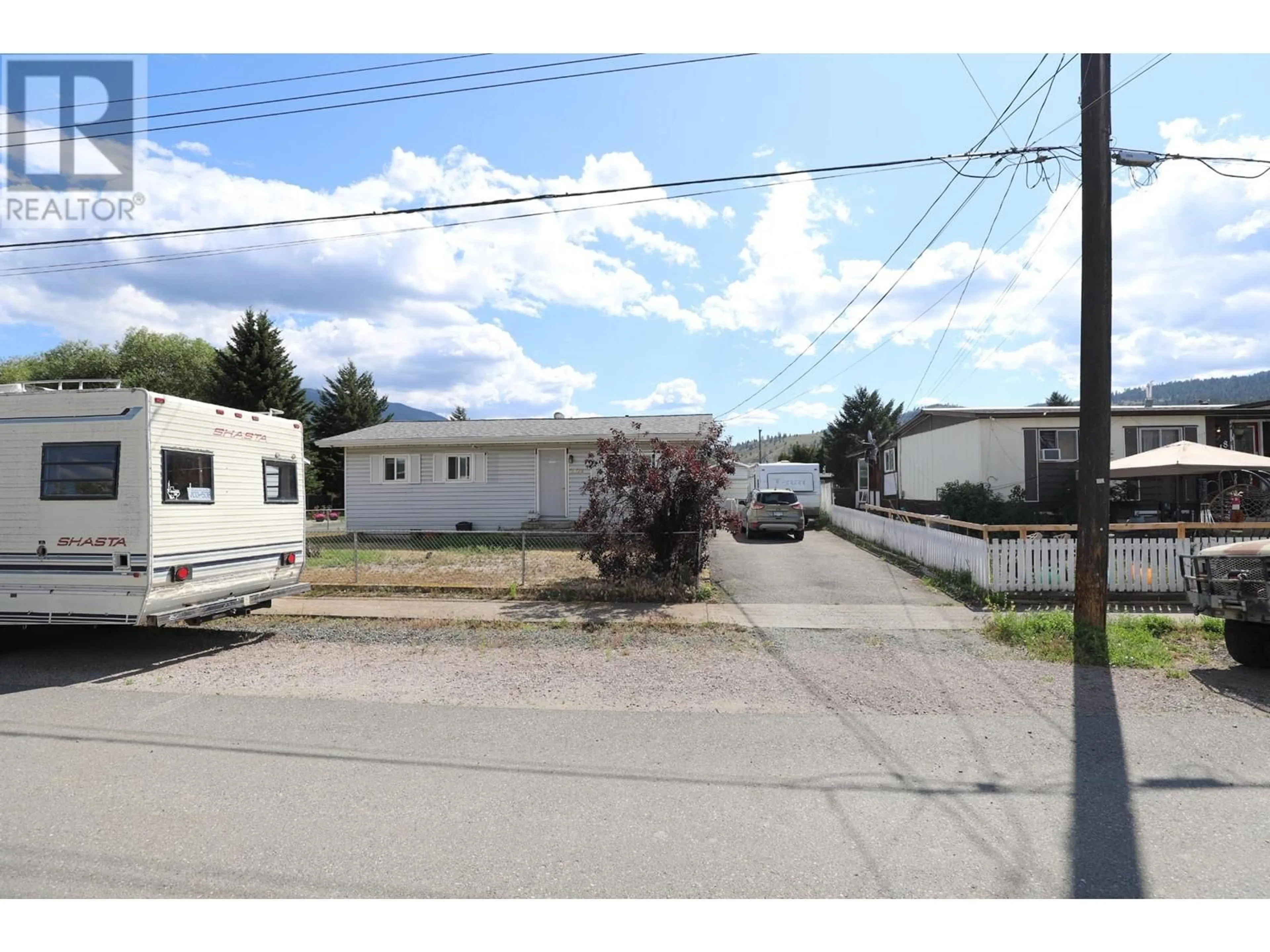 Frontside or backside of a home, the street view for 2128 CLAPPERTON Avenue, Merritt British Columbia V1K1B8